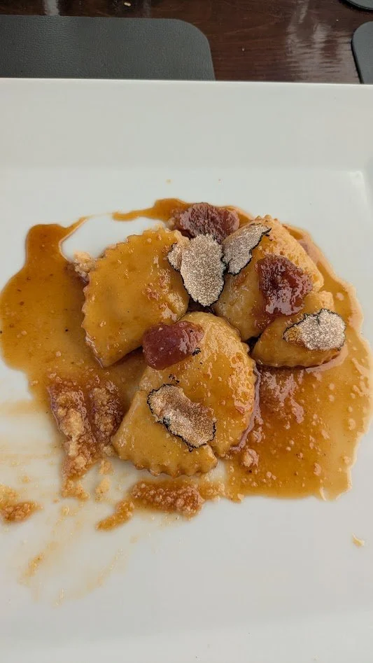 This was YUMMY - it was a truffle ravioli dessert. Yes, dessert! The inside was white chocolate with truffles. It was topped with some kind of sticky sweet sauce and figs and truffles. They seriously use truffles in everything.