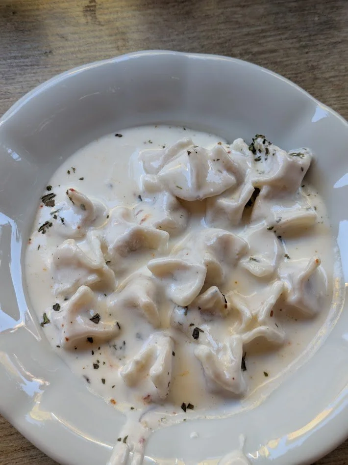 Mantı - small dumplings filled with spiced ground beef or lamb, served topped with garlic yogurt and a drizzle of spiced butter. Grady was pretty unimpressed with them. But in all fairness, no dumpling will ever compare to the khinkali we had in Geor