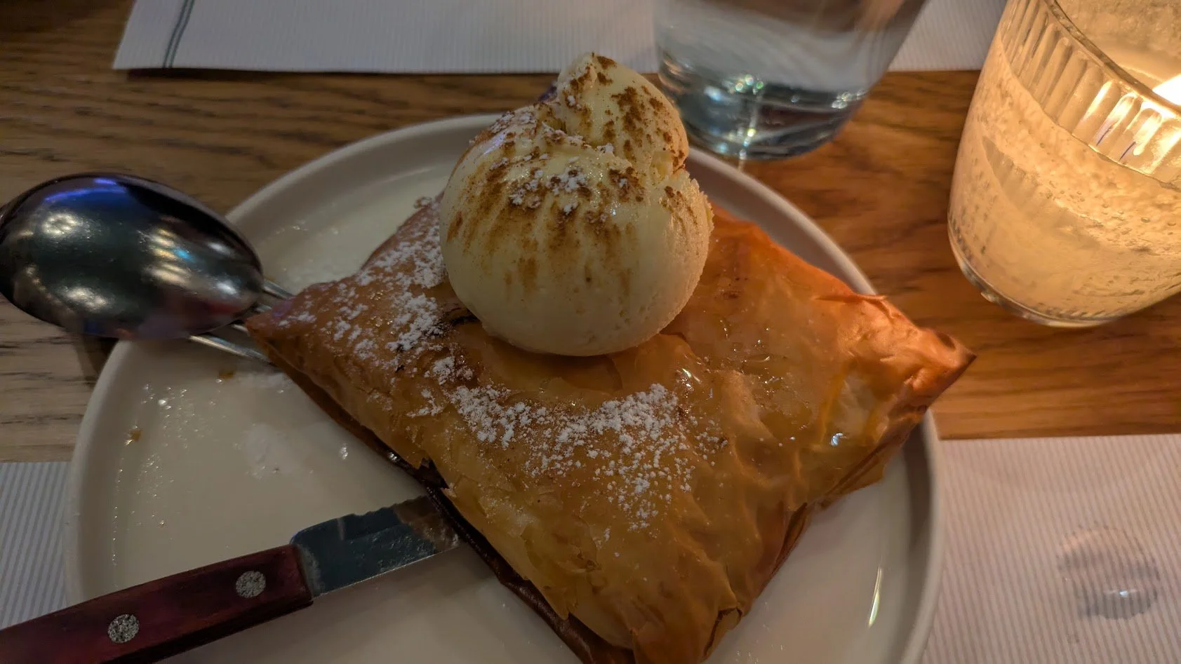 Galaktoboureko - a traditional Greek dessert consisting of fresh goats milk custard baked between layers of filo pastry, soaked in a scented sugar syrup (often featuring lemon or orange). To die for! 