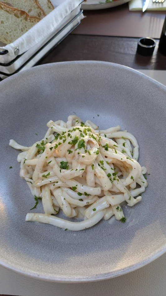 Cacio e Pepe Calamari - It is like a pasta dish that but they use thin slices of squid in place of the pasta. It is tossed in a creamy,  sauce made from Pecorino cheese, butter or olive oil, and cracked black pepper (basically an alfredo sauce). This