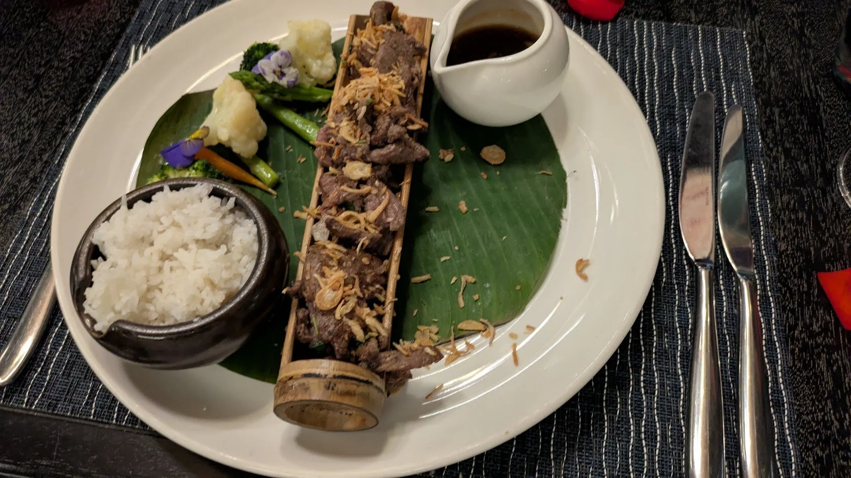 Vietnamese grilled beef in bamboo - It is exactly what it sounds like. Seasoned chunks of beef grilled in a bamboo shoot. Grady had it for his birthday dinner and said it was amazing.