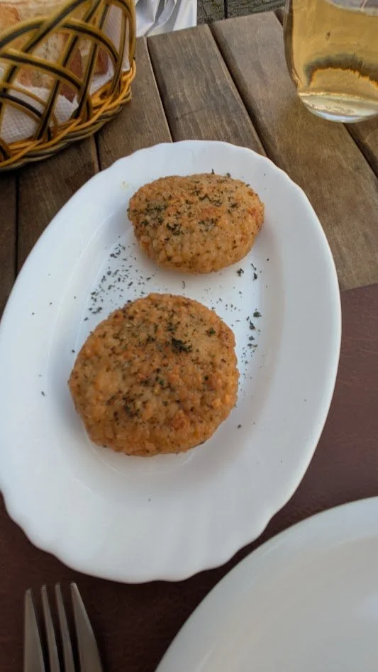 Qifqi - vegetarian dish from the historic city of Gjirokastër. They are essentially bite-sized, herb-infused rice balls, made by mixing cooked rice with beaten eggs, flour, and dried mint. These things were totally TASTELESS!