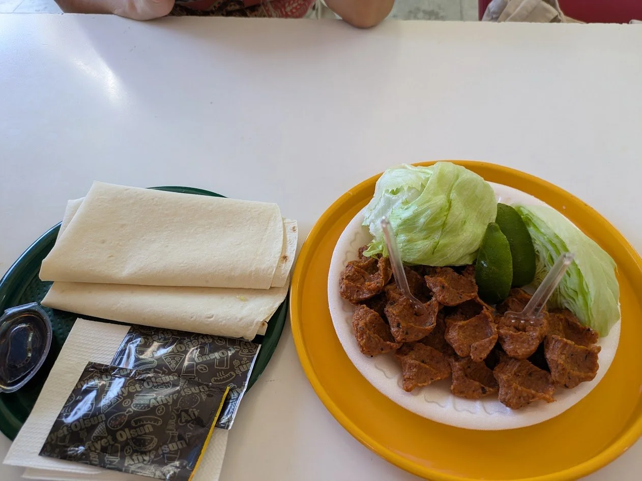 Çiğ Köfte - this has been in Turkish cuisine for 3000 years. It is made with bulgur, tomato paste, pepper paste, pomegranate syrup, and lots of spices which are kneaded together for about an hour.  You wrap it in either lettuce or  a spring roll wrap