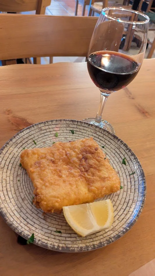 Saganaki - pan-seared cheese—commonly Kefalograviera, Kefalotyri, or Graviera—resulting in a crispy, golden crust and a warm, gooey interior. Typically dusted with flour and fried, it is served with lemon juice. We ate way to much of this!! It was so