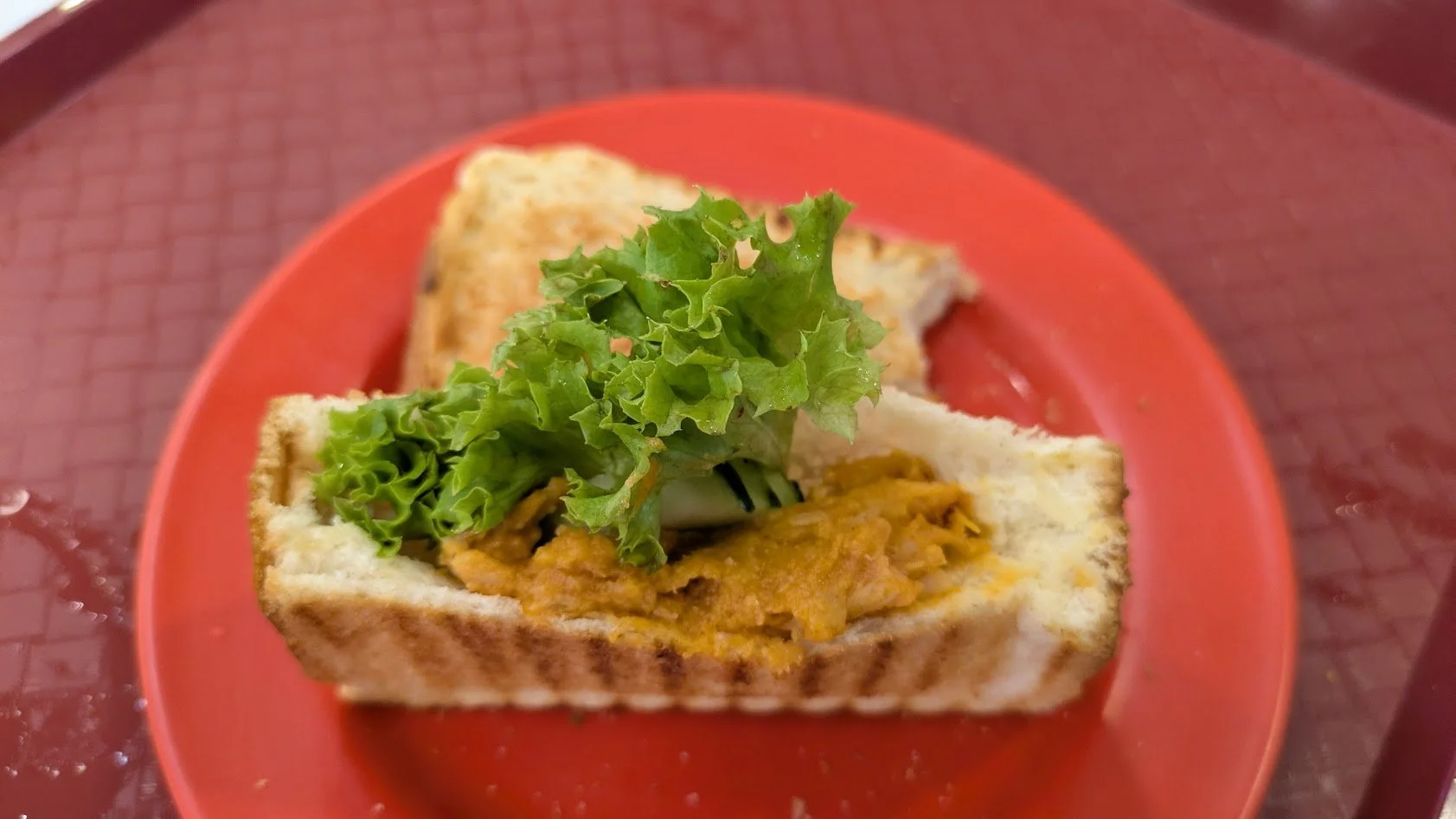 Chili Crab Toast - We wanted to try the traditional dish of Chili Crab, but we ran out of time, so Grady settled for this during our final breakfast as an alternative. It is an  adaptation of the country's iconic chili crab dish, featuring sweet, spi