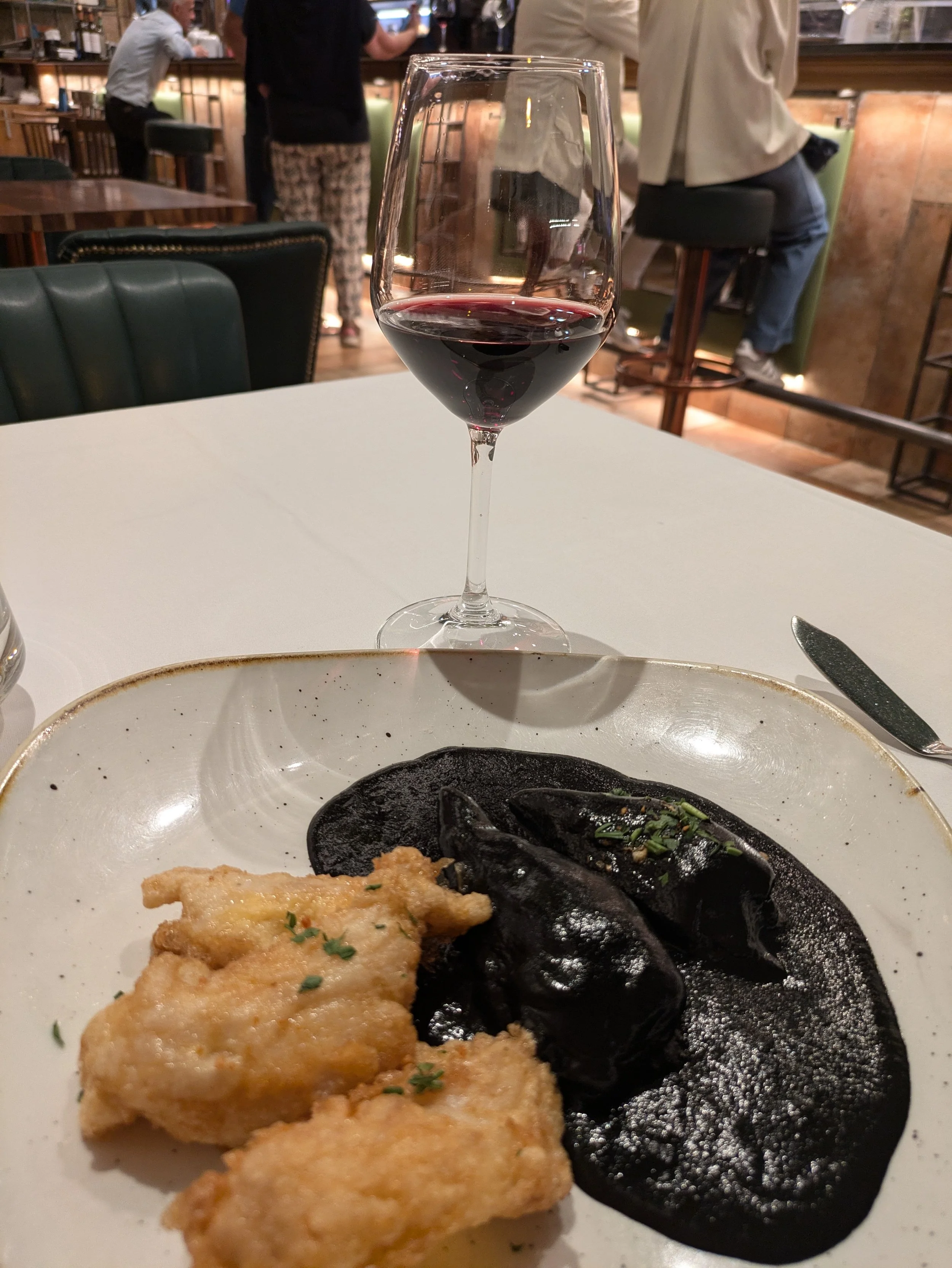 Squid in its own ink - we were told multiple times how delicious it is and that it is a local favorite. It was ok. We don't know what the "ink" is and we decided we probably don't want to know, so we never looked it up!