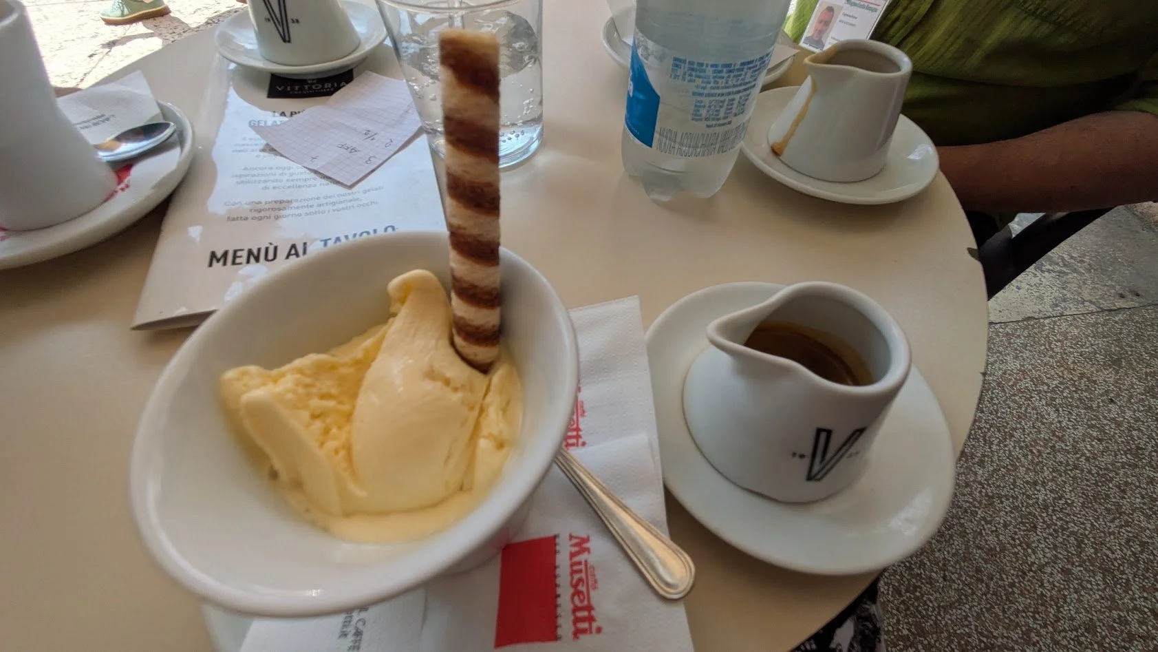 Affogato - Yummy dessert of high quality vanilla ice cream served with a shot of espresso on the side that you pour over the ice cream. You can eat most of it with a spoon, then drink whatever is fully melted. Really good!