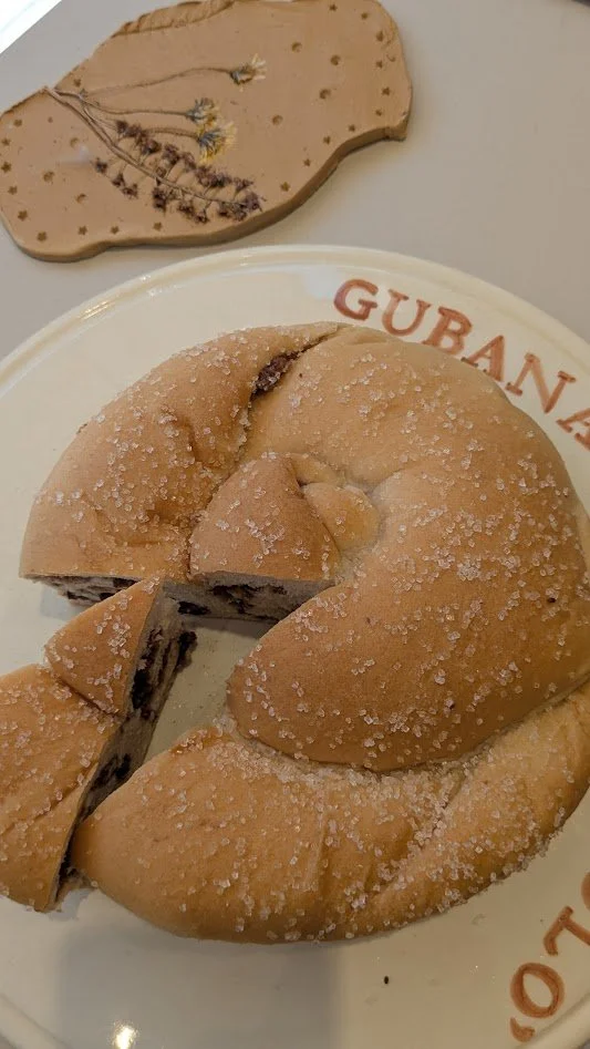 Gubana - a traditional Italian sweet bread from northeastern Italy.  It's spiral shaped and filled with nuts, dried fruits, and spices.