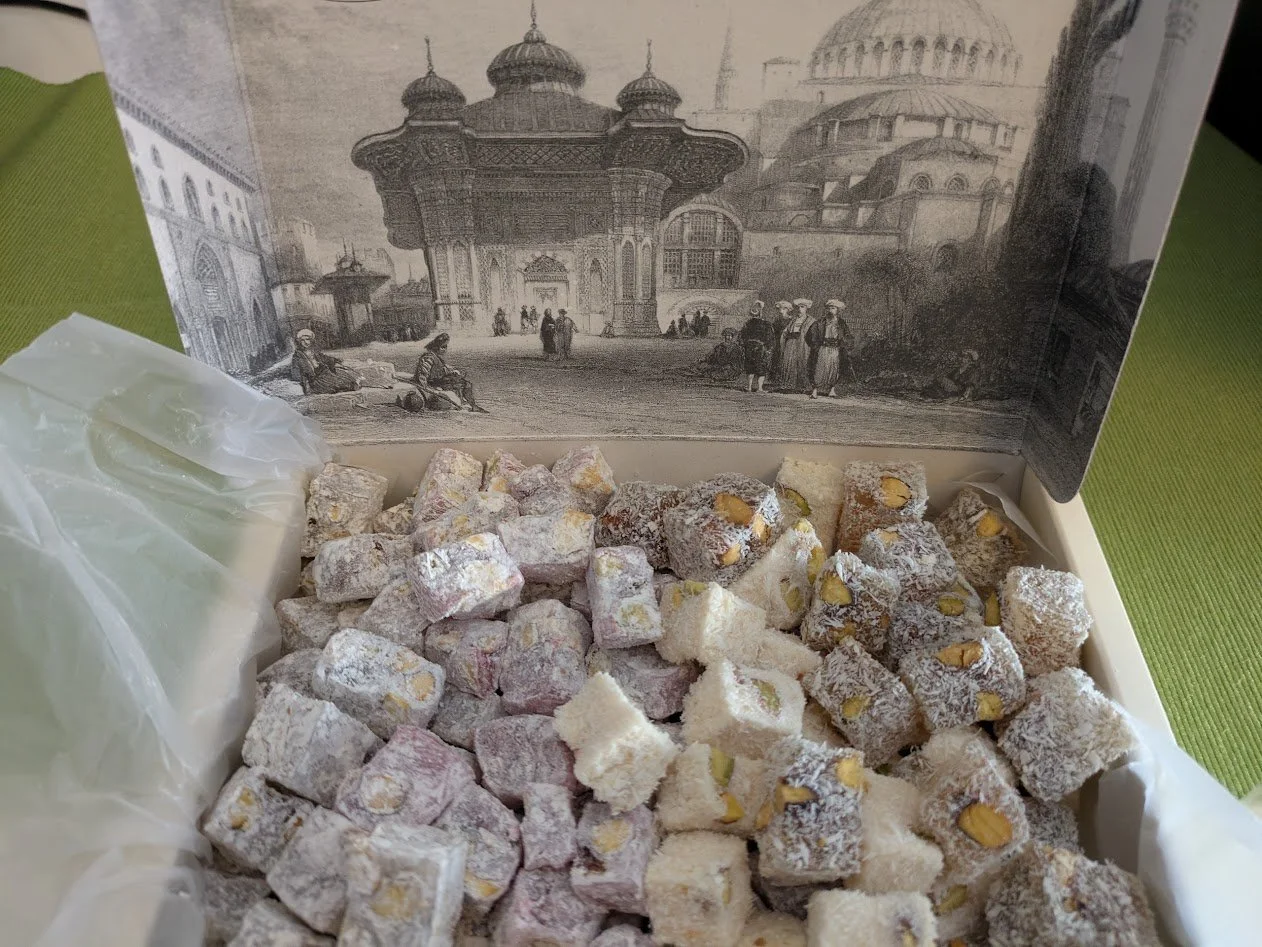 Turkish delight - a confection based on a gel of starch and sugar with chopped dates, pistachios, hazelnuts or walnuts bound by the gel. They love this stuff... I don't really get it.