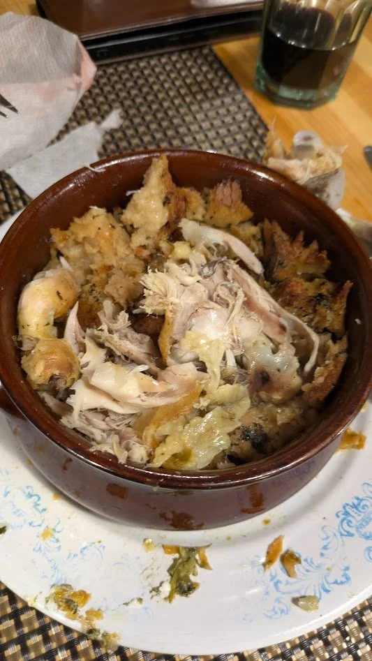 Pule me Përshesh - We made this in our cooking class. It was pretty easy! We started with a chunk of a traditional village style cornbread that we had to break apart into the bottom of the crock pot (breaking it apart wasn't easy!). Then we added chi