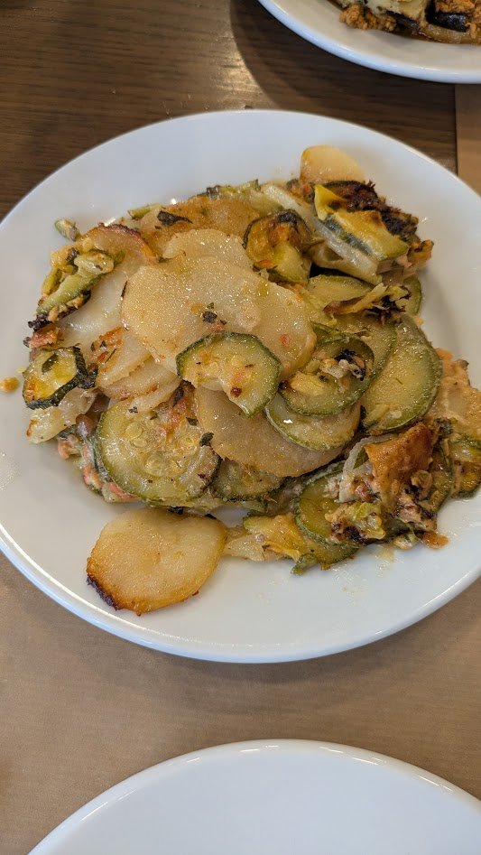 Briam - a traditional Greek oven-roasted vegetable casserole of zucchini, potatoes, eggplant, and onions—slow-cooked in significant amounts of olive oil and seasoned  garlic, oregano, and parsley. This was right up my alley! I could eat this every da