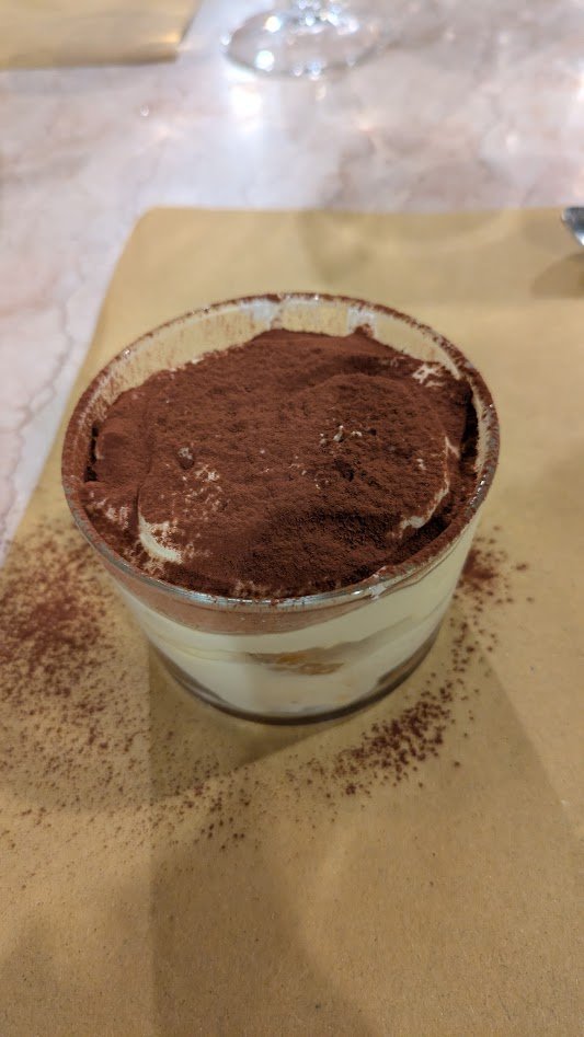 Tiramisu - a no-bake dessert with layers of espresso-soaked ladyfingers and a cream made from mascarpone cheese, eggs, and sugar. It originated from the Veneto region of northeastern Italy and translates literally to "pick me up" for the energizing c