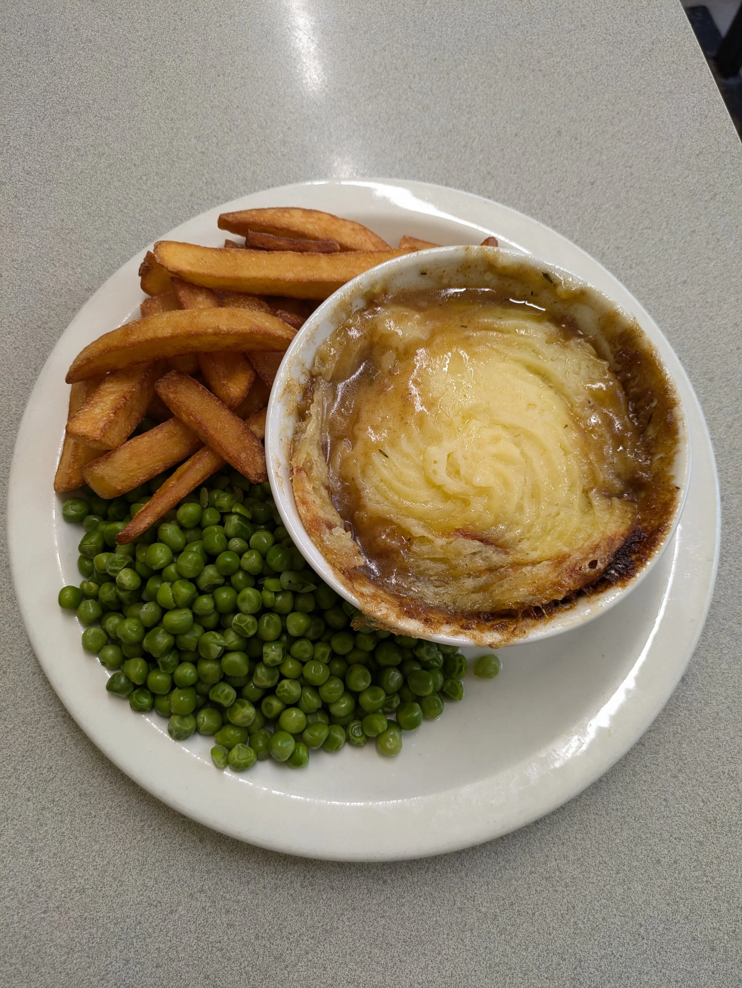 Cottage pie - Consists of a ground beef base, gravy with vegetables, and a layer of mashed potatoes.