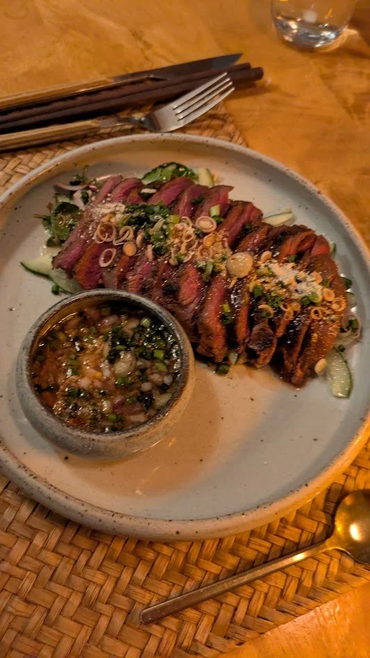 Crying Tiger - Seared marinated buffalo steak with tamarind chili sauce supposedly hot enough to make even a tiger cry. Grady ate it with no issue. He said it was delicious.