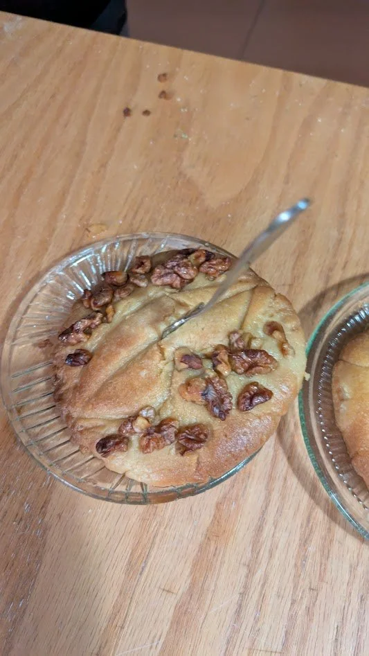 Sheqerpare - We made this in our cooking class. It is basically a giant shortbread-like cookie made with butter, eggs, and sugar then topped with walnuts. After they were baked, we dumped A LOT of hot sugar/water syrup over them... and let them sit f