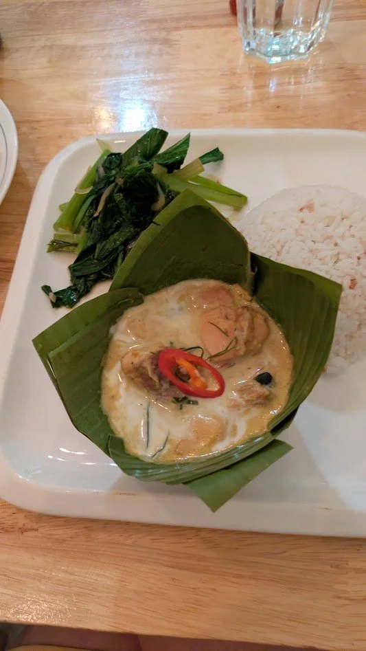 Fish amok - a celebrated Cambodian national dish consisting of freshwater fish covered in a thick, coconut-based curry with lemongrass. It is traditionally steamed in banana leaf cups. I could have eaten this every day!!!  
