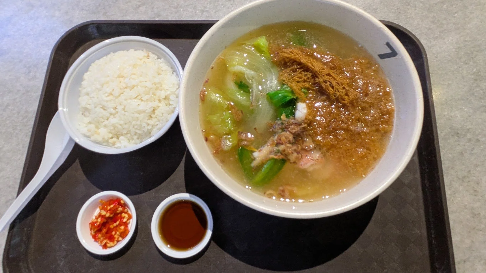 Red grouper sliced fish laksa - a premium, comforting hawker dish combining fresh red grouper fish slices with spicy coconut-based broth. It was good.