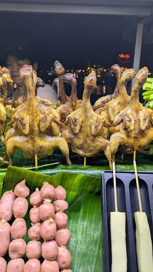 Chim cut - small grilled birds (usually quail). They are a popular street food, marinated  then roasted. We (Grady) didn't eat these, but to be fair, for those of you that eat meat, it's probably no different than eating a chicken or duck. Just sayin