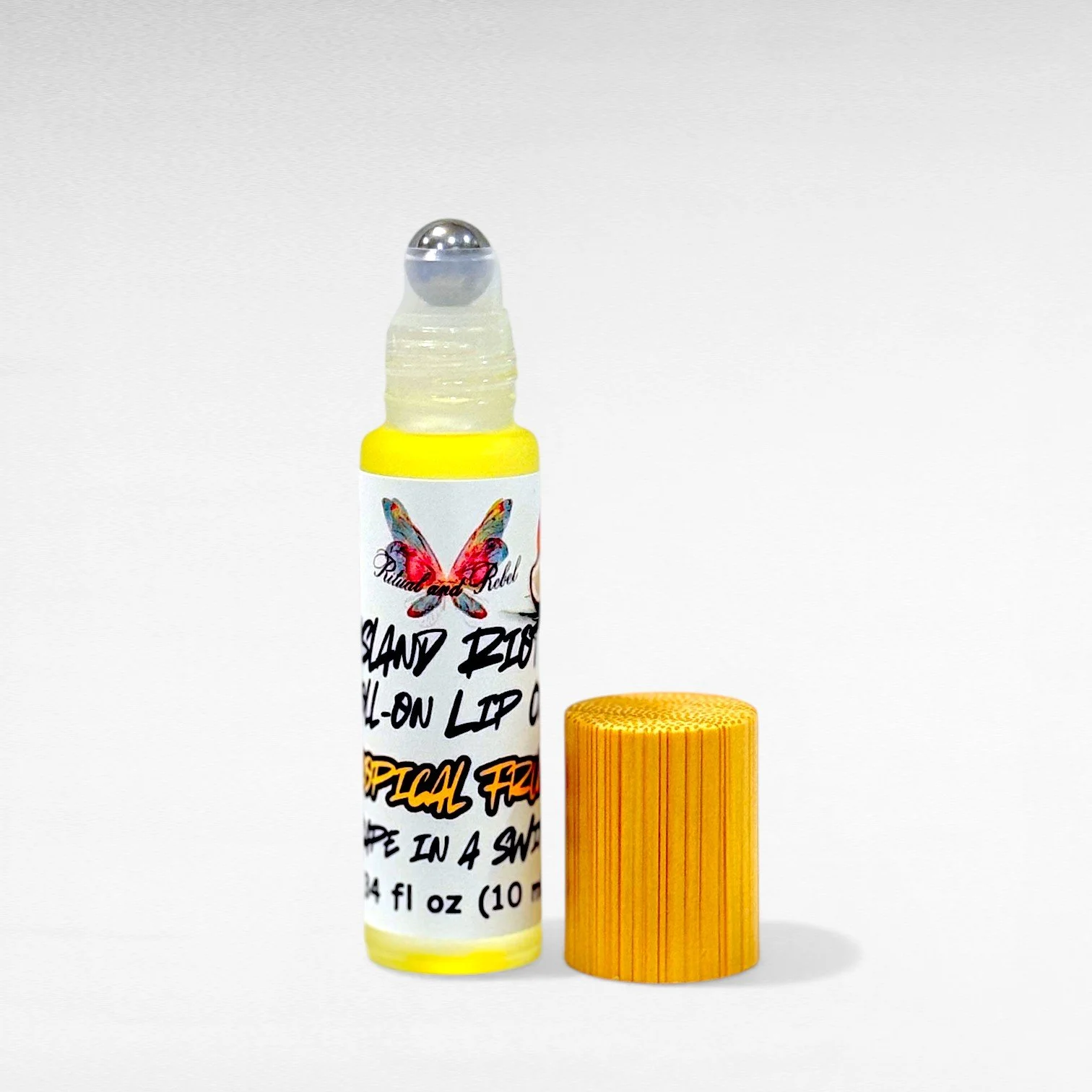 island riot roll on lip oil ritual and rebel.jpg