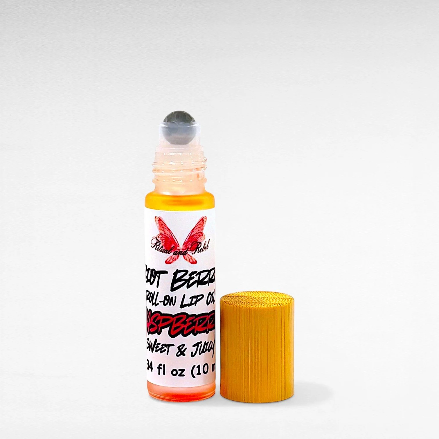 riot berry raspberry lip oil .jpg