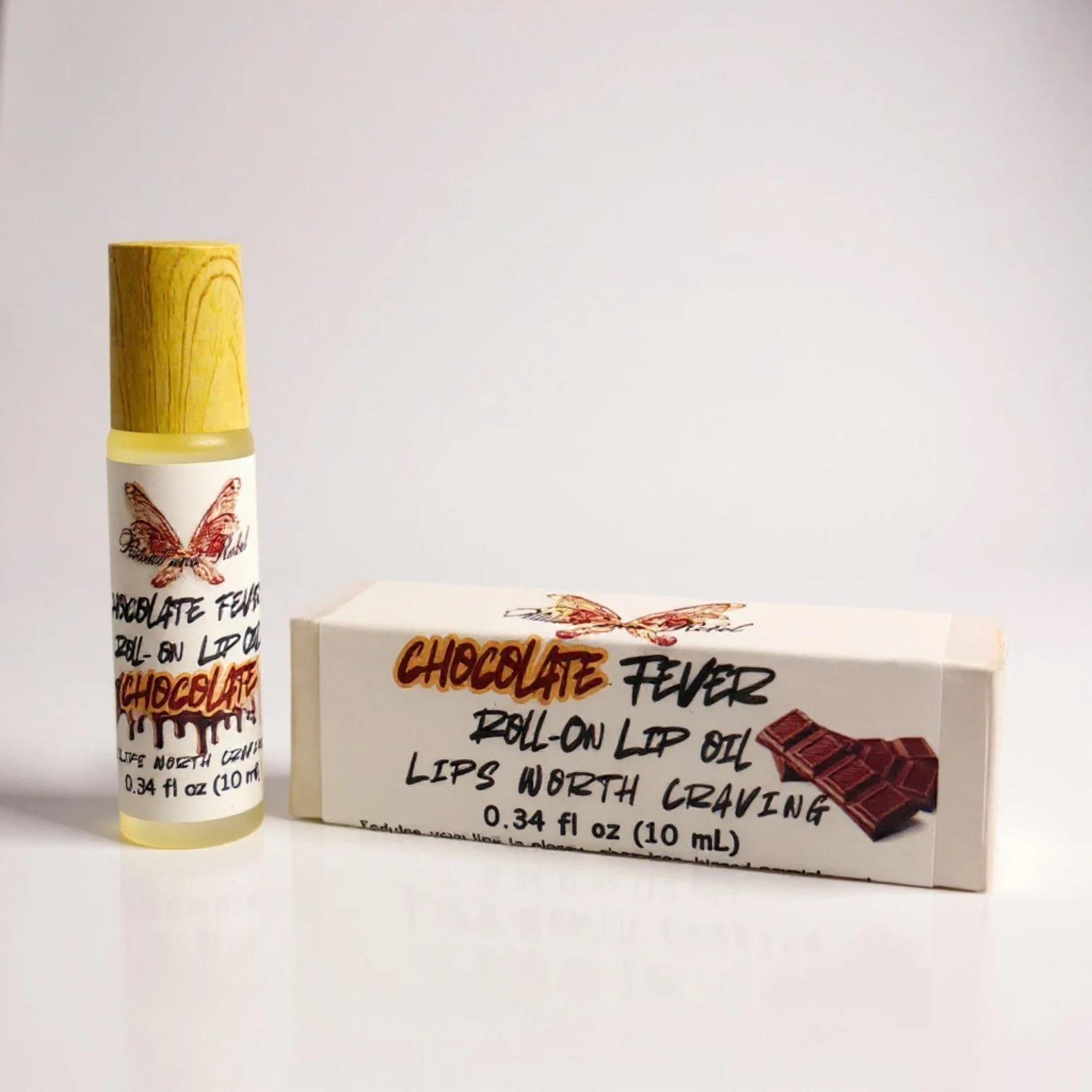Chocolate fever roll on lip oil and product box ritual and rebel (1).jpg