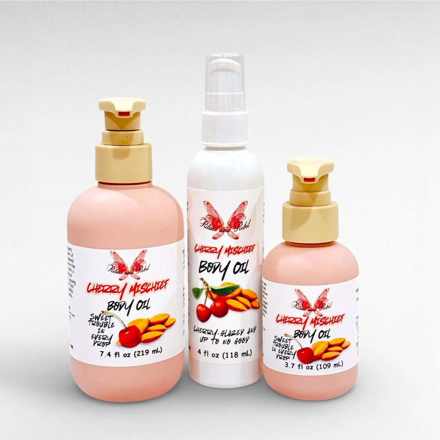 3.7, 4, 7.4 Cherry Mischief Body Oil bottles Ritual and rebel.jpg