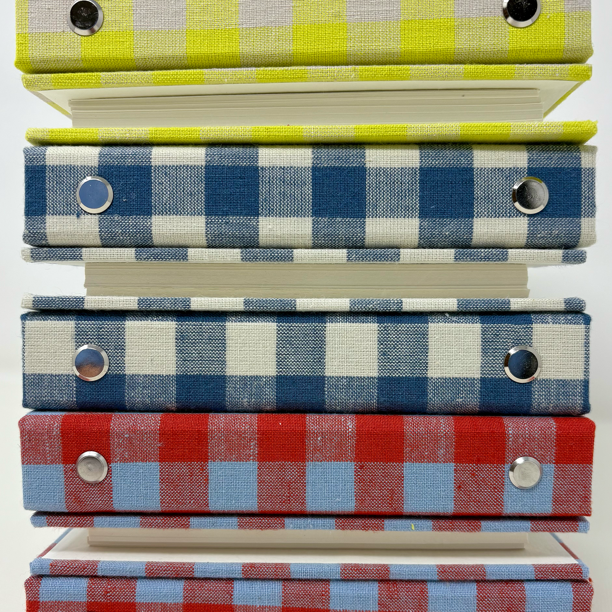 Design of custom clothbound notebooks.