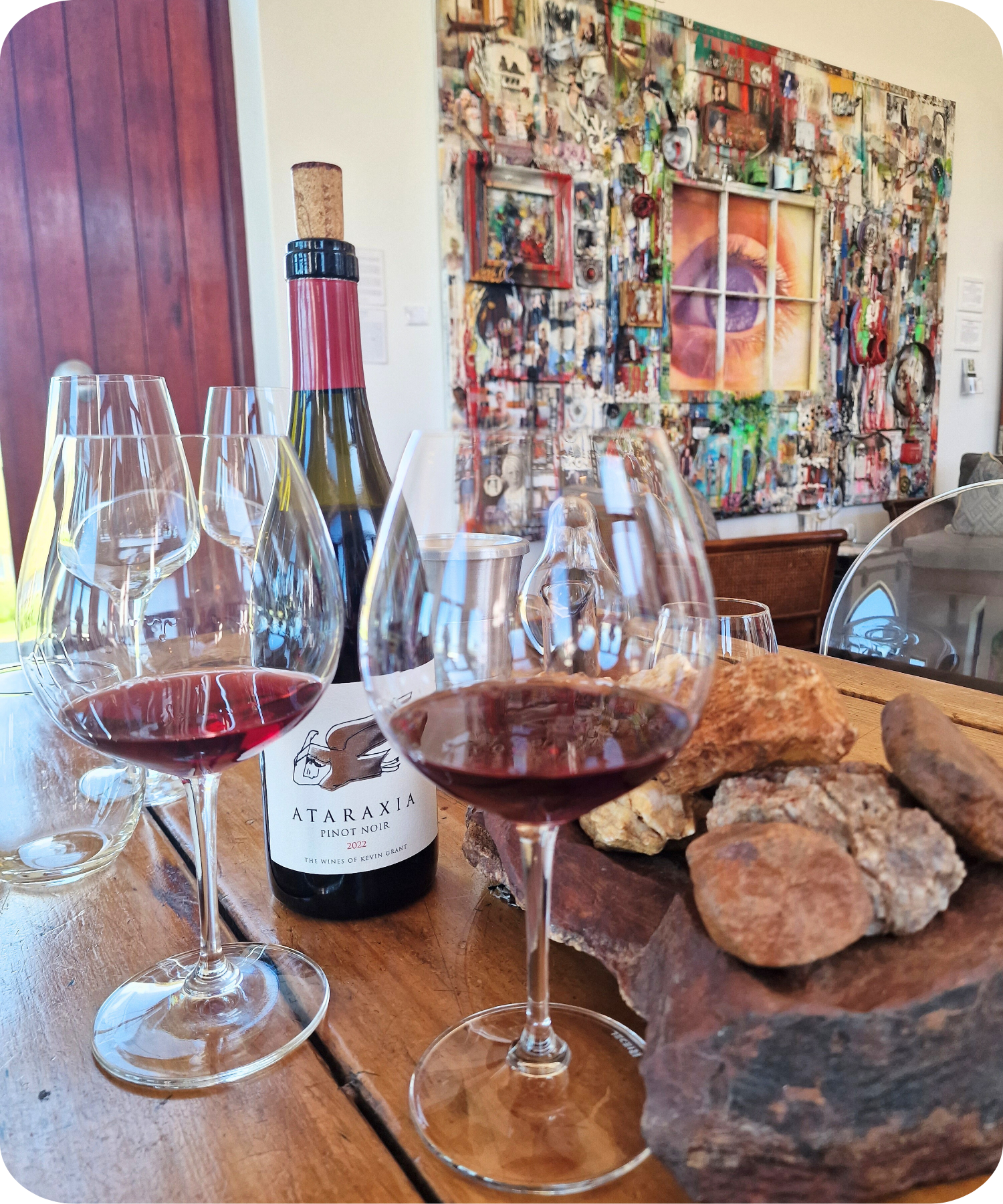 South African wine tasting experience with red wine glasses and local vineyard produce