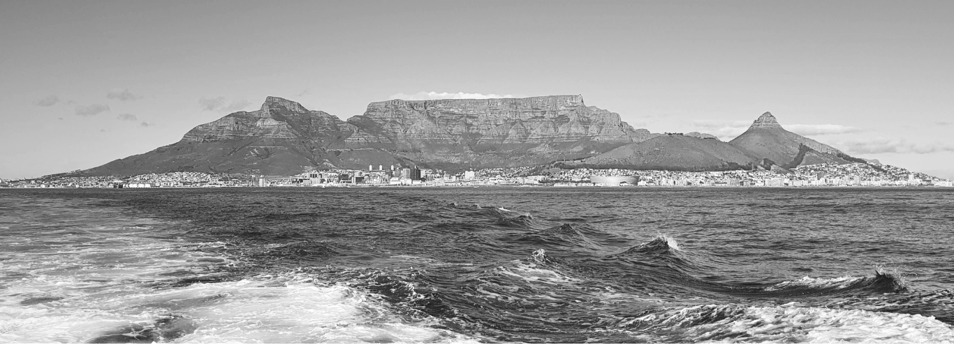 Table Mountain and Cape Town coastline viewed from the ocean in South Africa
