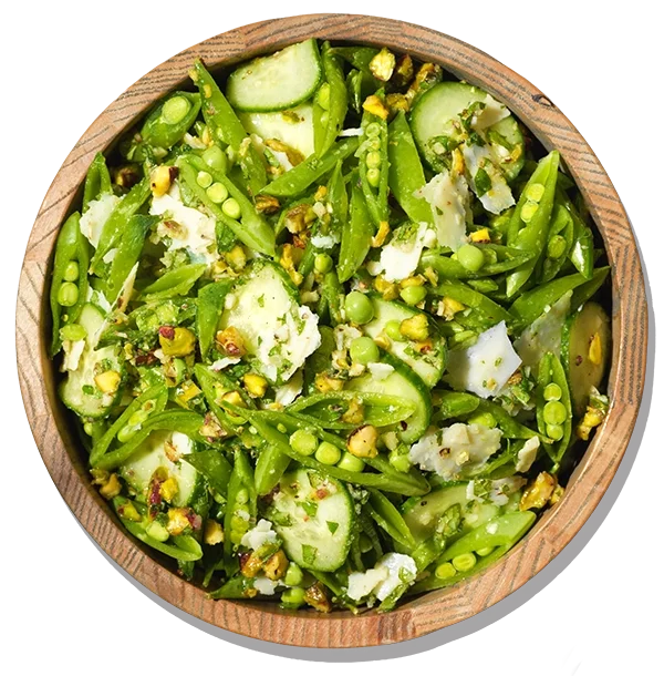 Lemon Dijon Sugar Pea Salad in wooden bowl.