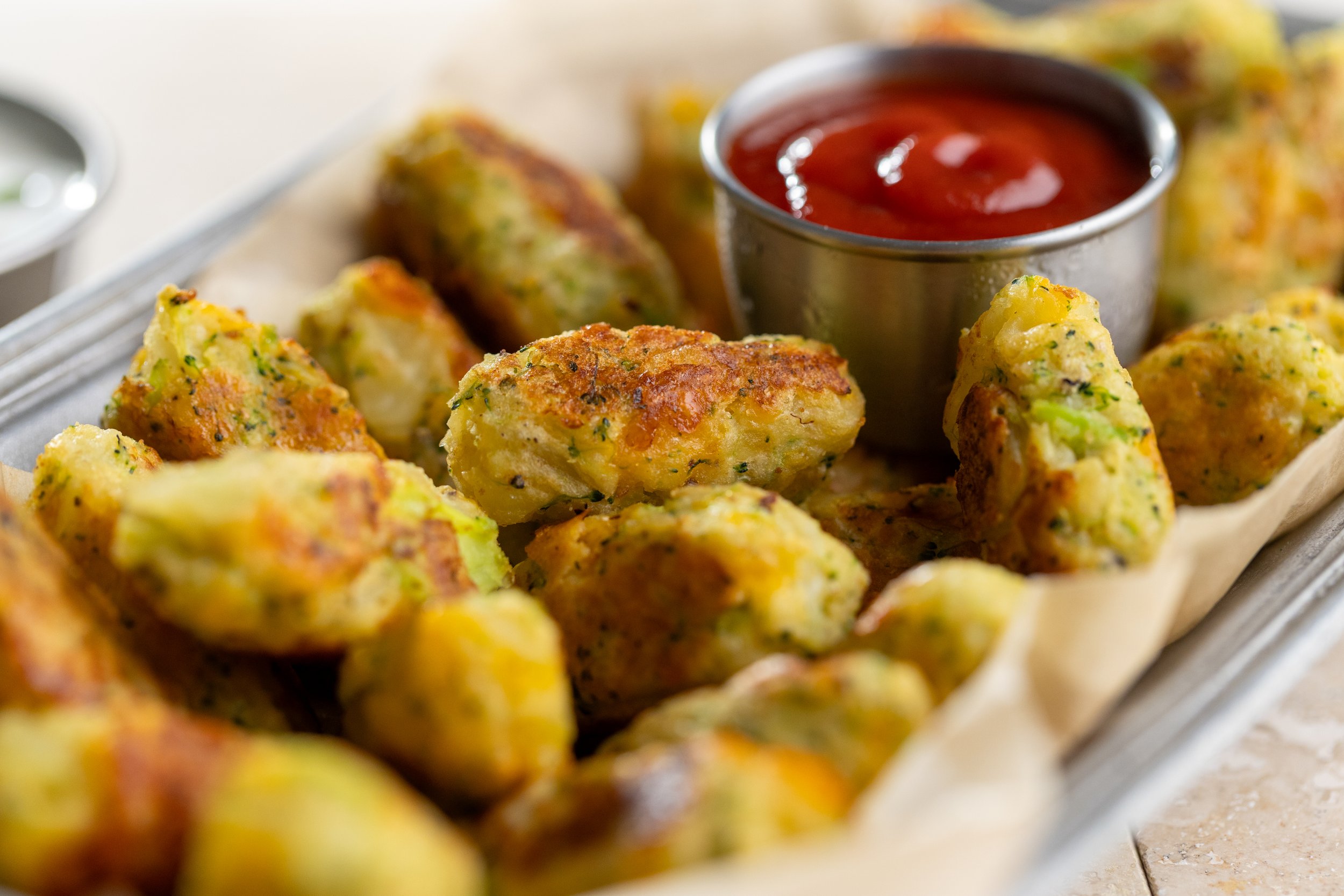 Broccoli Cauliflower Tater Tots with ketchup
