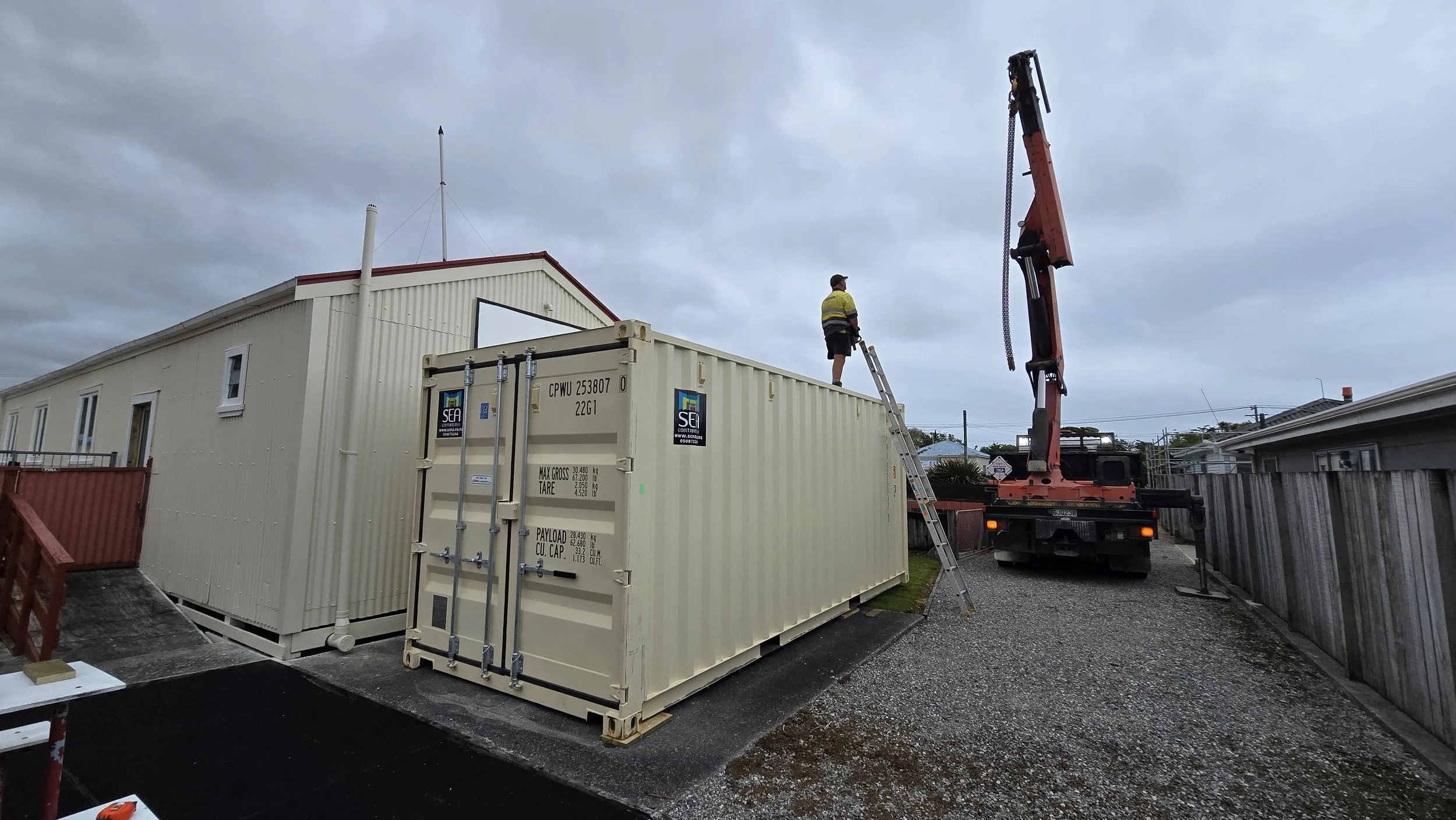 New shipping Container replacing the Church Garage.
