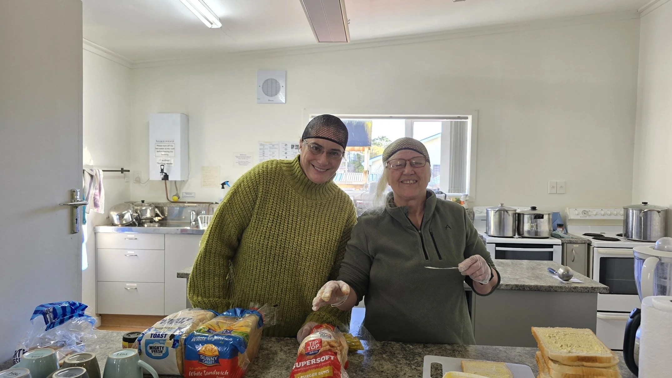 Angela and Anita ready to serve