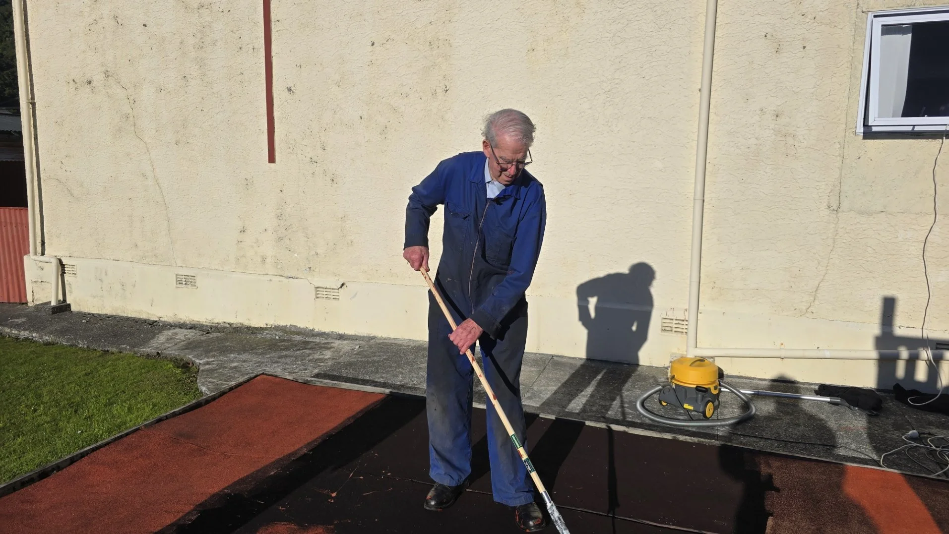 Gideon Painting the playground base