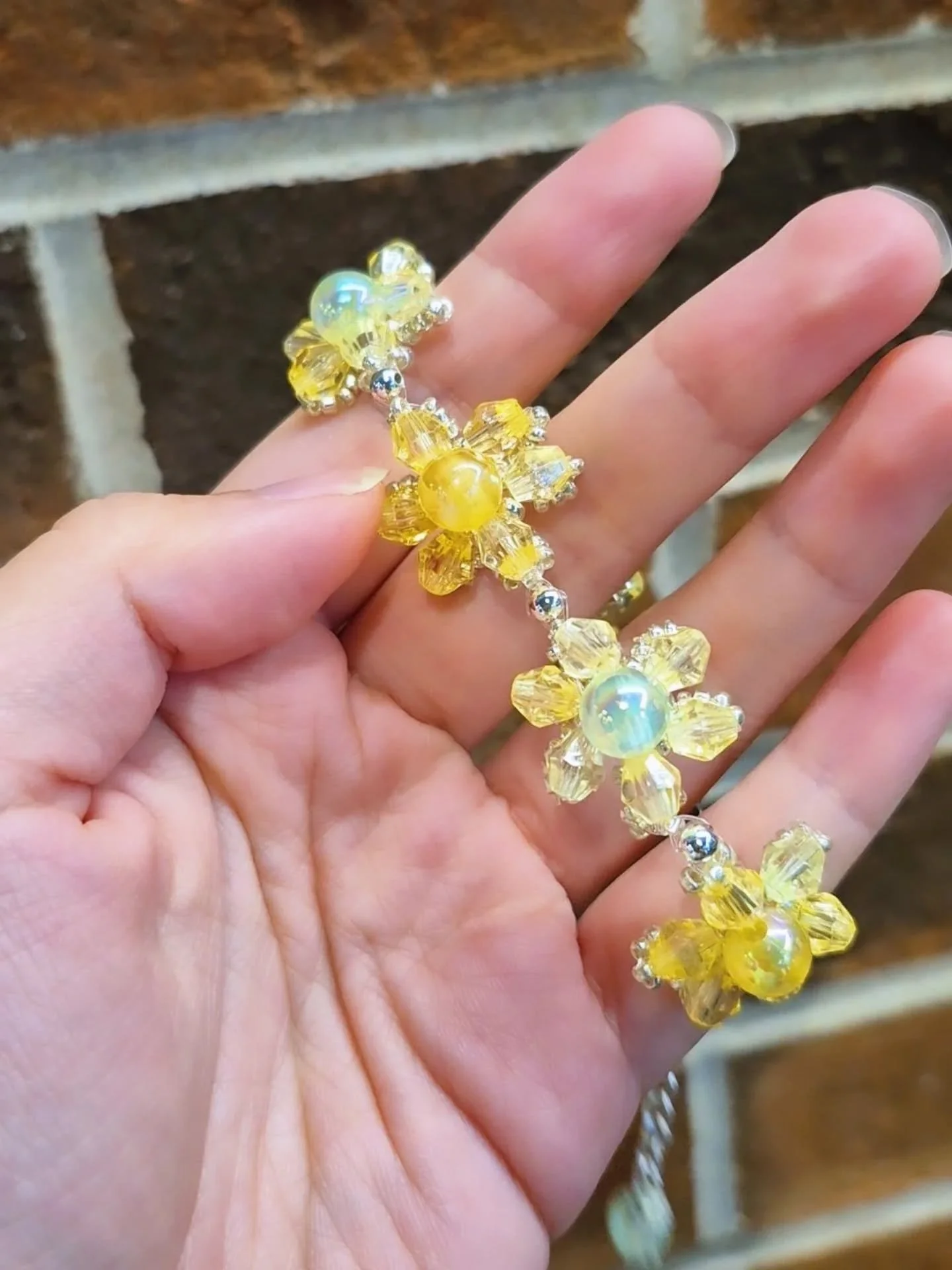 Experimenting with some more complicated designs with various beads, and I'm pretty happy with how this bangle turned out! #wearperiphery