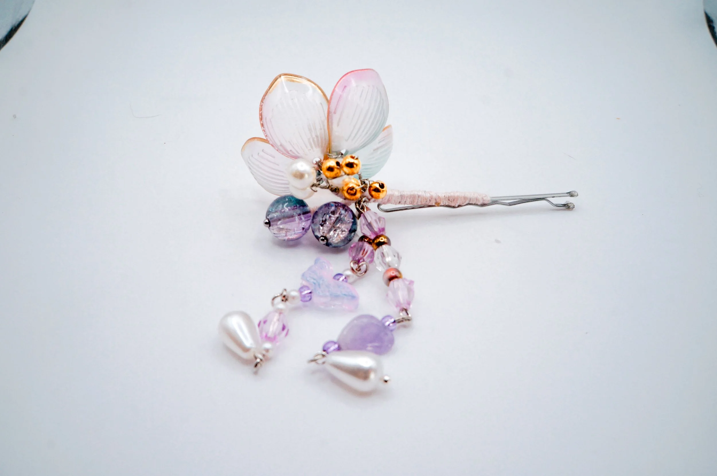 Hand crafted cherry blossom bobby pins with glass and natural stone beads and tassels