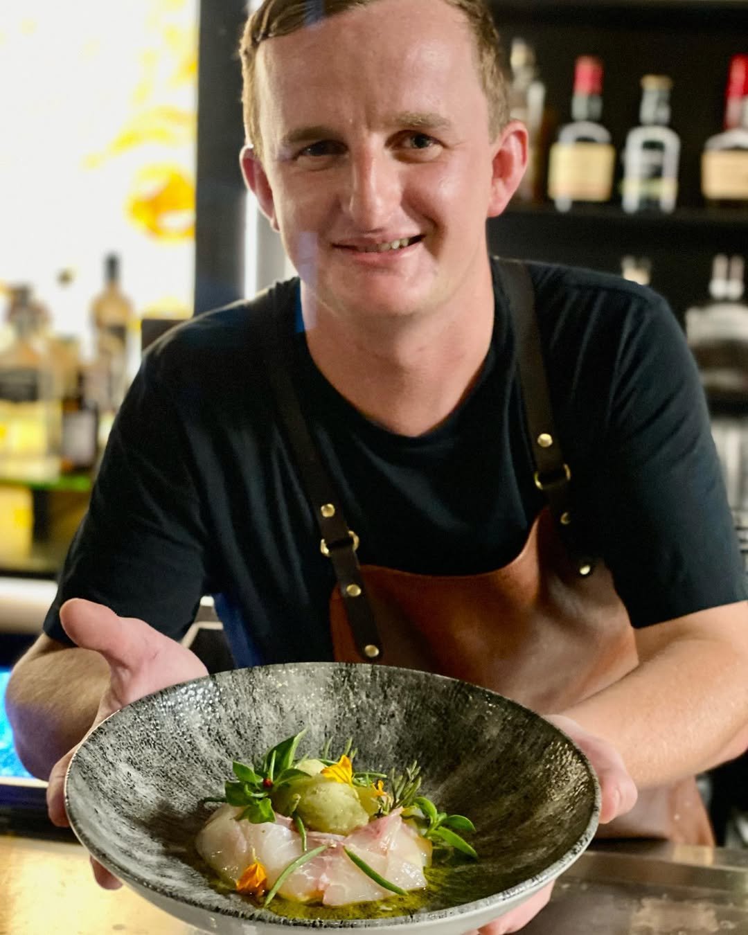 Cobia, cultured cream and garlic chive by Chef Kyle Bradley