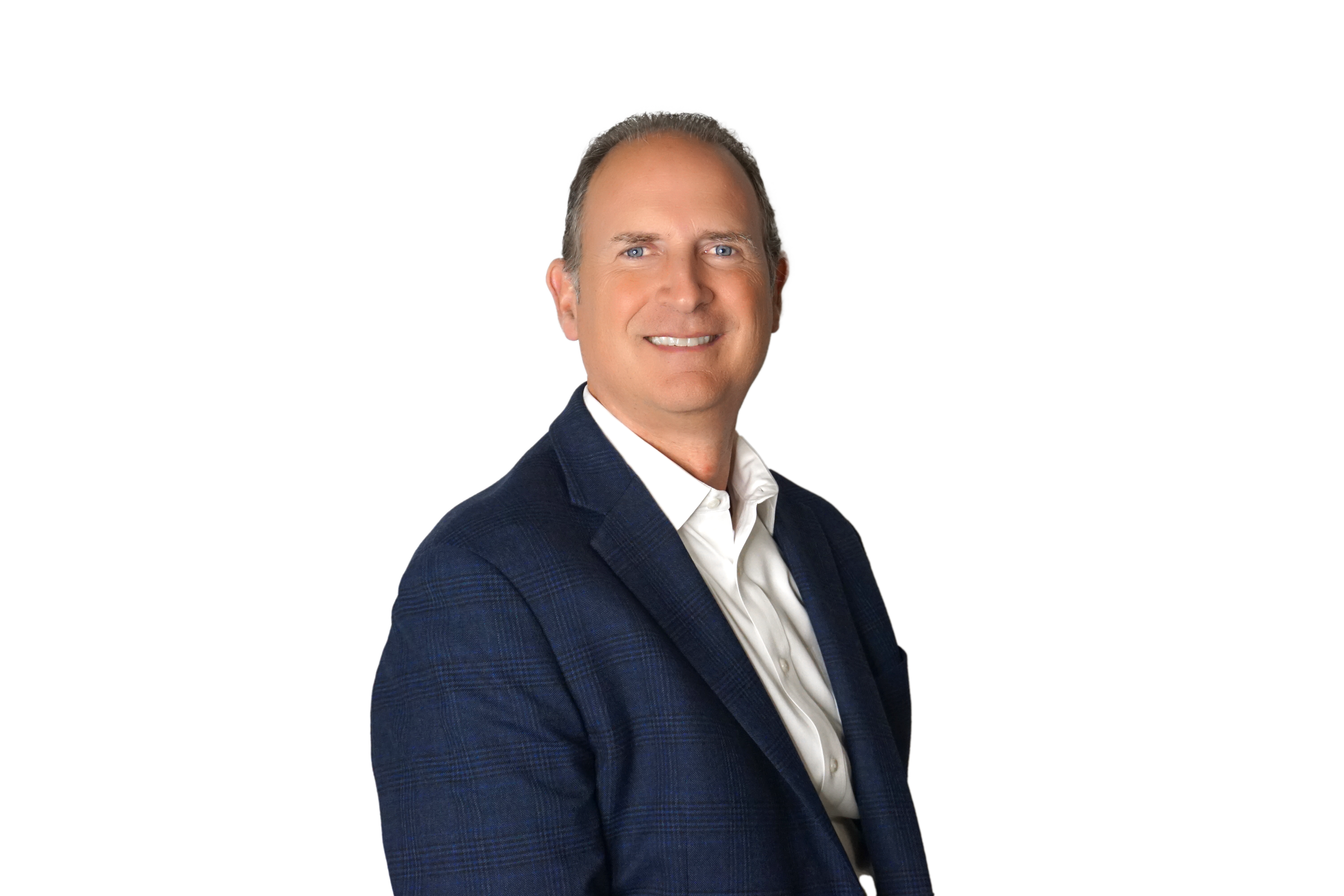 A man in a blue suit and white shirt smiling against a white background.