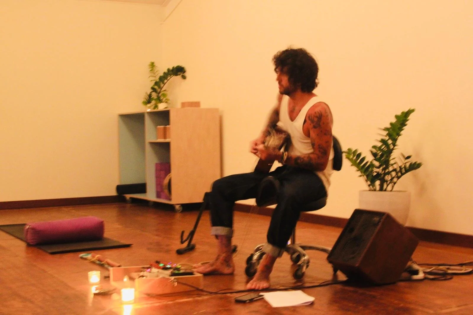 Taylor practicing music therapy, Balance, Therapy, Integrated Guidance, Coaching, Yoga, Workshop Facilitation and Art Therapy.