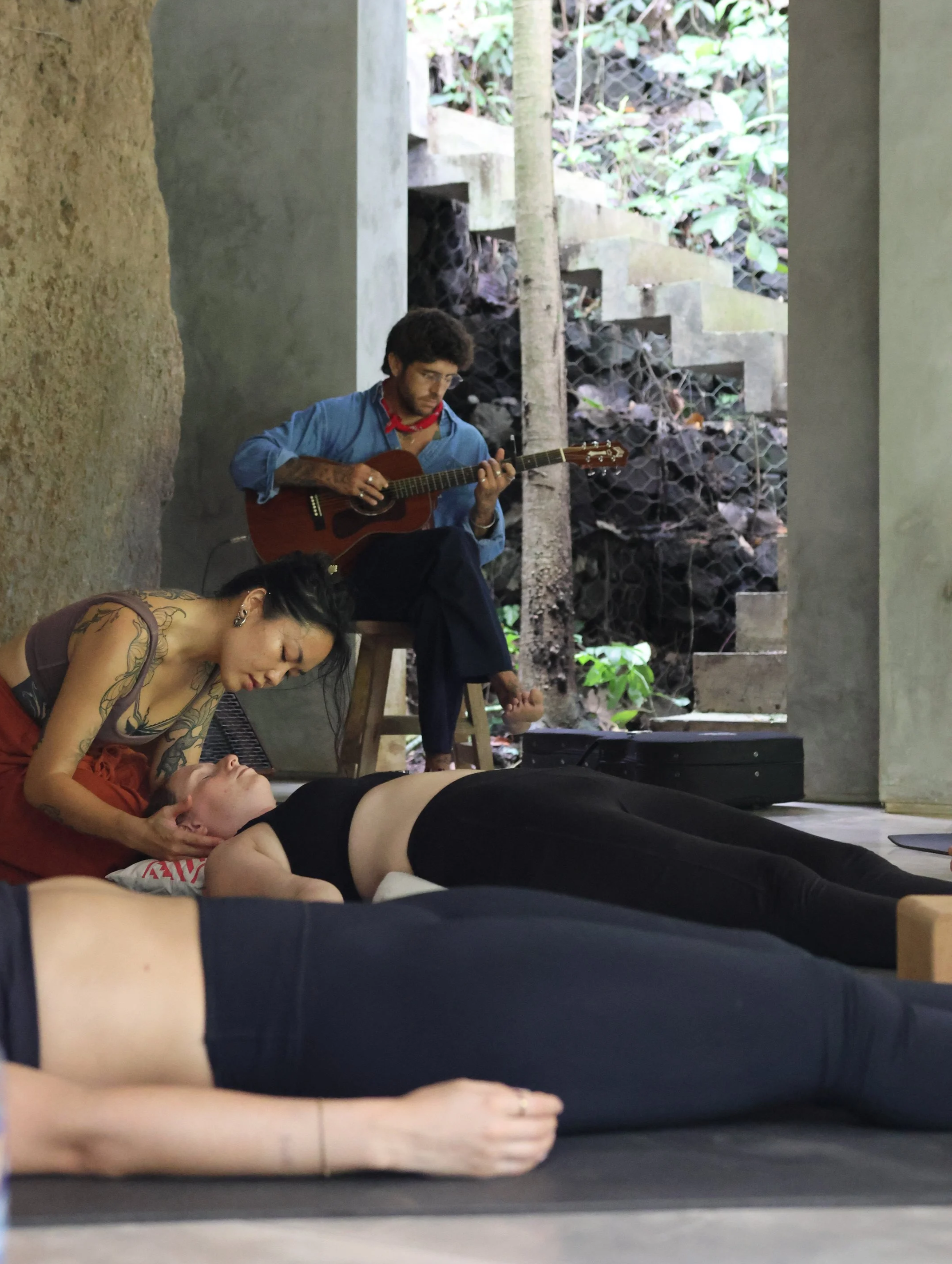 taylor playing music at a retreat, mindfulness, yoga, art therapy