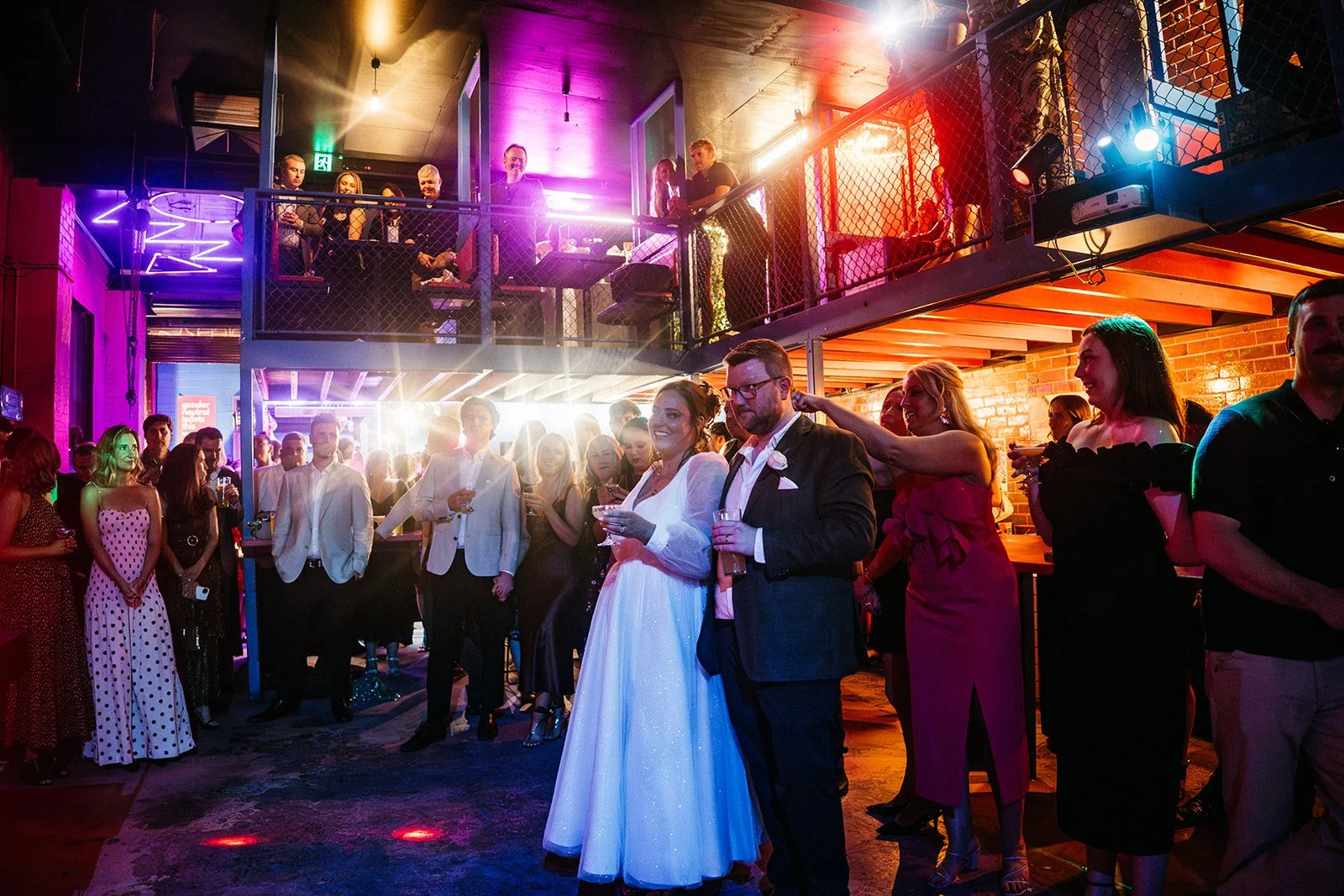 Wedding Couple Standing During Speeches at Evie's Disco Diner In Fitzroy