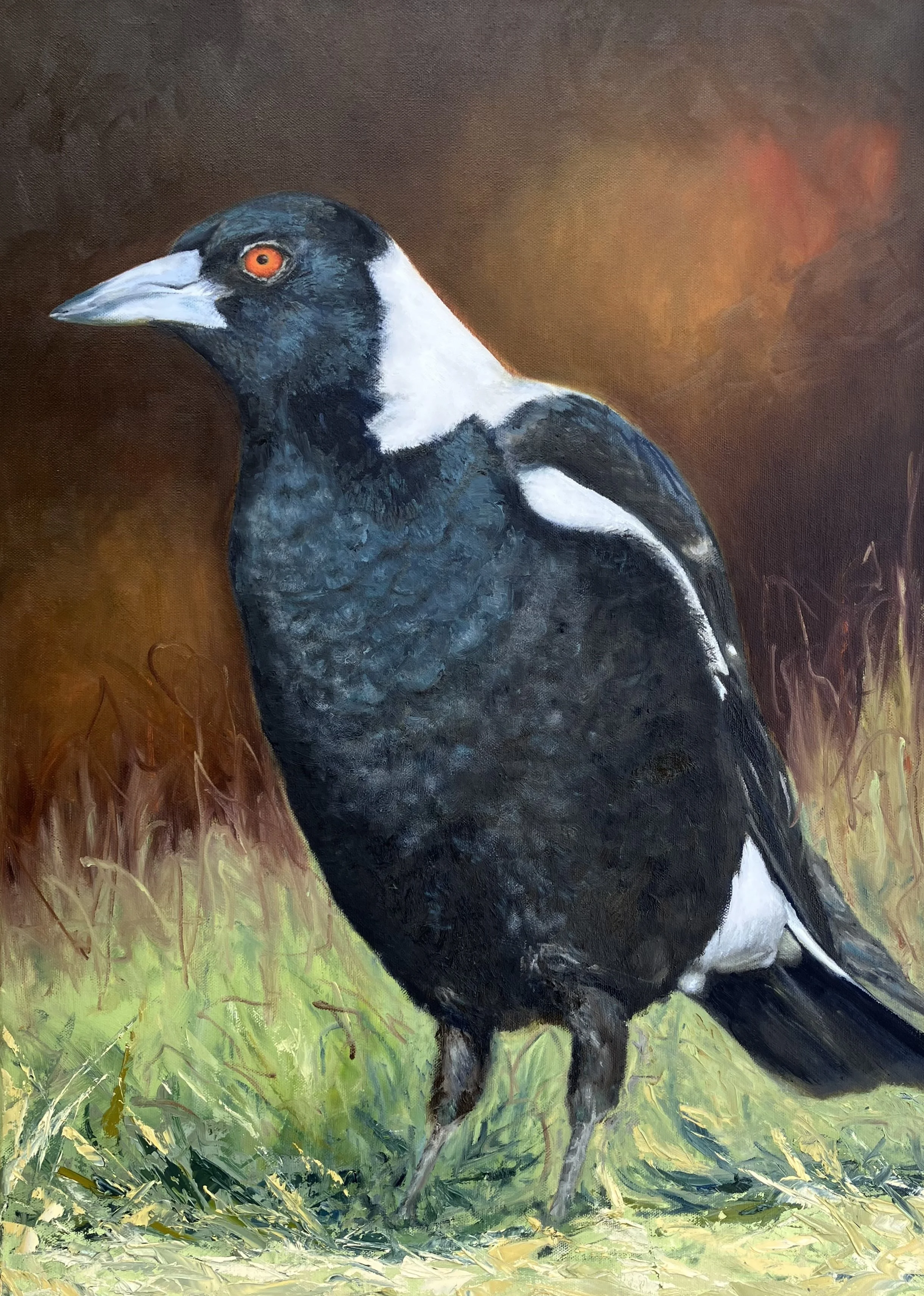 Painting of a black bird with white markings on its neck and a bright orange eye, standing on grass with a brown and orange background.