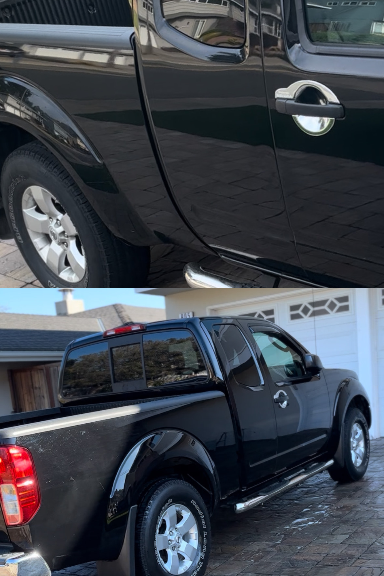 A black pickup truck parked on a paved driveway in front of a house, shown from a side angle.
