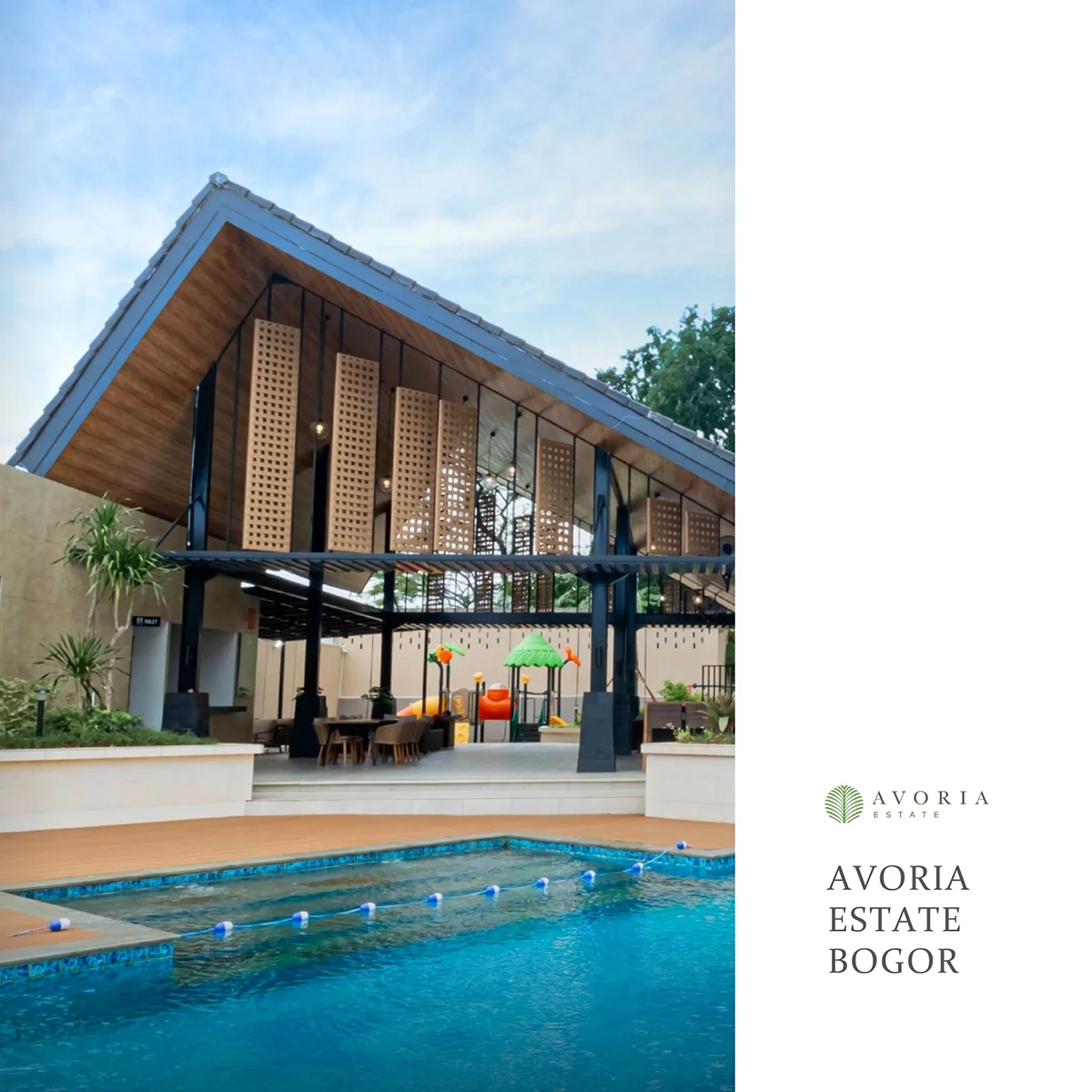 Modern building with sloped roof and wooden lattice panels, outdoor area with playground and swimming pool at Avoria Estate Bogor