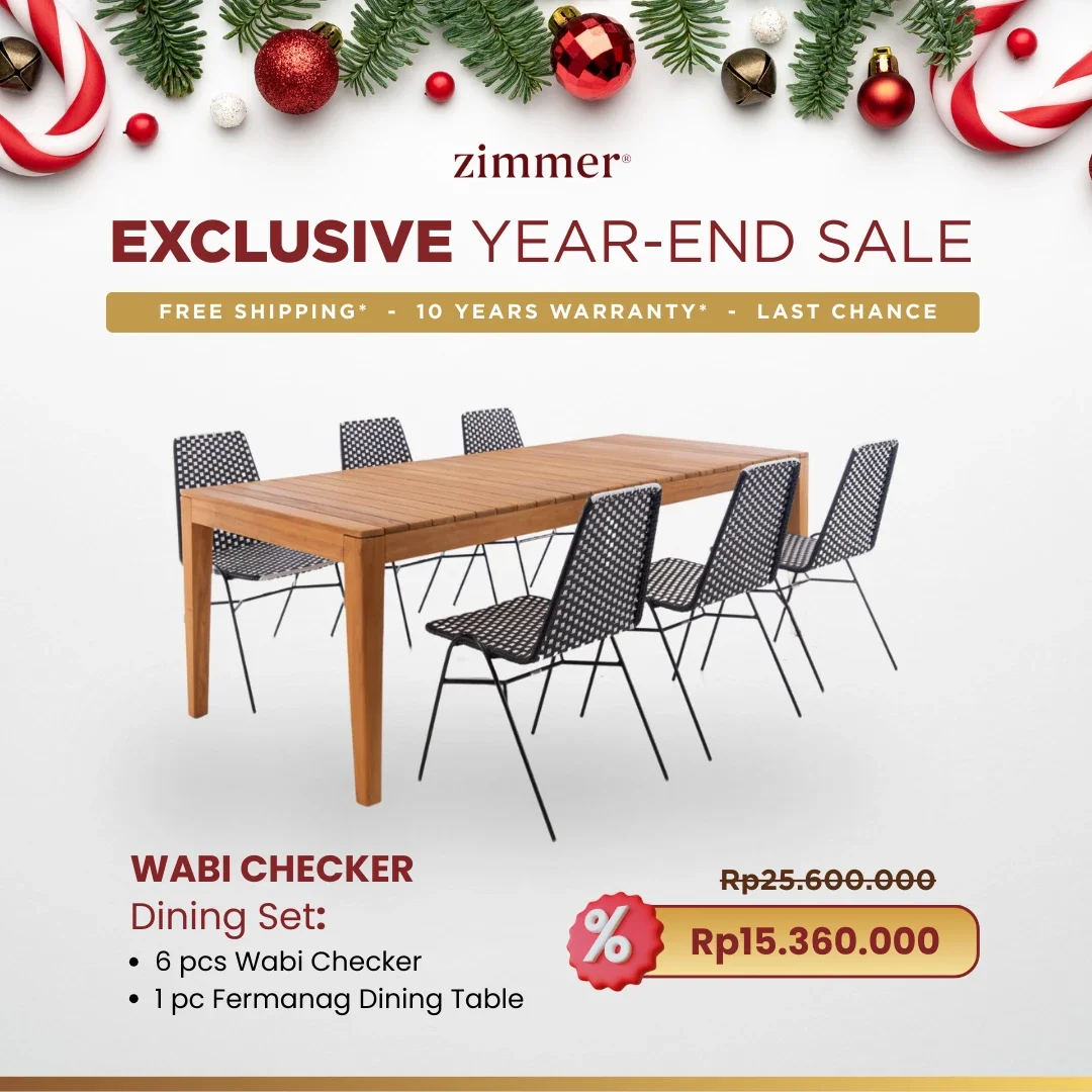 An advertisement for Zimmer's exclusive year-end sale featuring a Wabi Checker dining set, including six Wabi Checker chairs and one Fermnang dining table. The ad showcases a decorated Christmas border with pine branches and ornaments. The original p