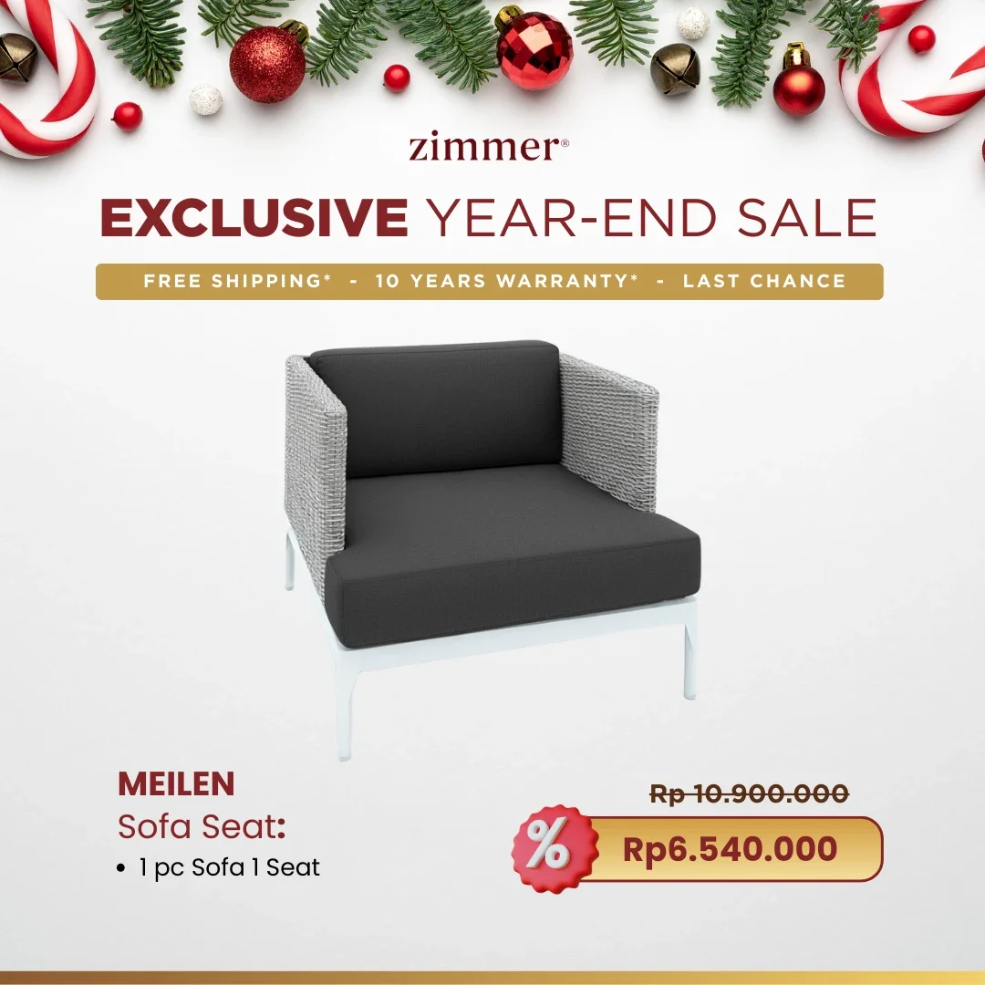 A Christmas-themed advertisement for Zimmer's exclusive year-end sale featuring a modern sofa with a black cushion, gray woven armrests, and white legs. The ad highlights free shipping, a 10-year warranty, and the discounted price of Rp6,540,000, mar