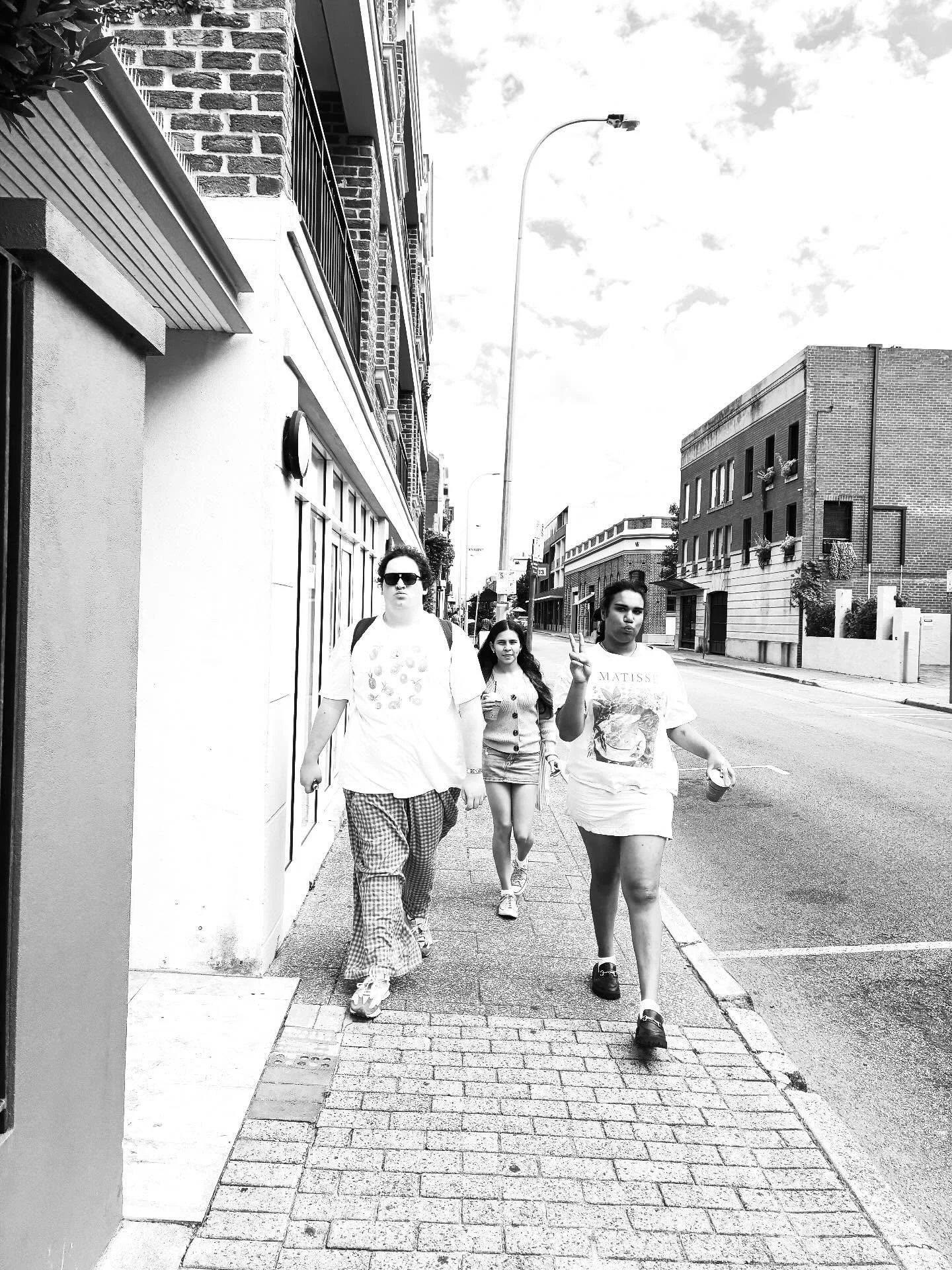 Strolling the streets of Freeo, minds blown by the beauty, ready to listen and learn!