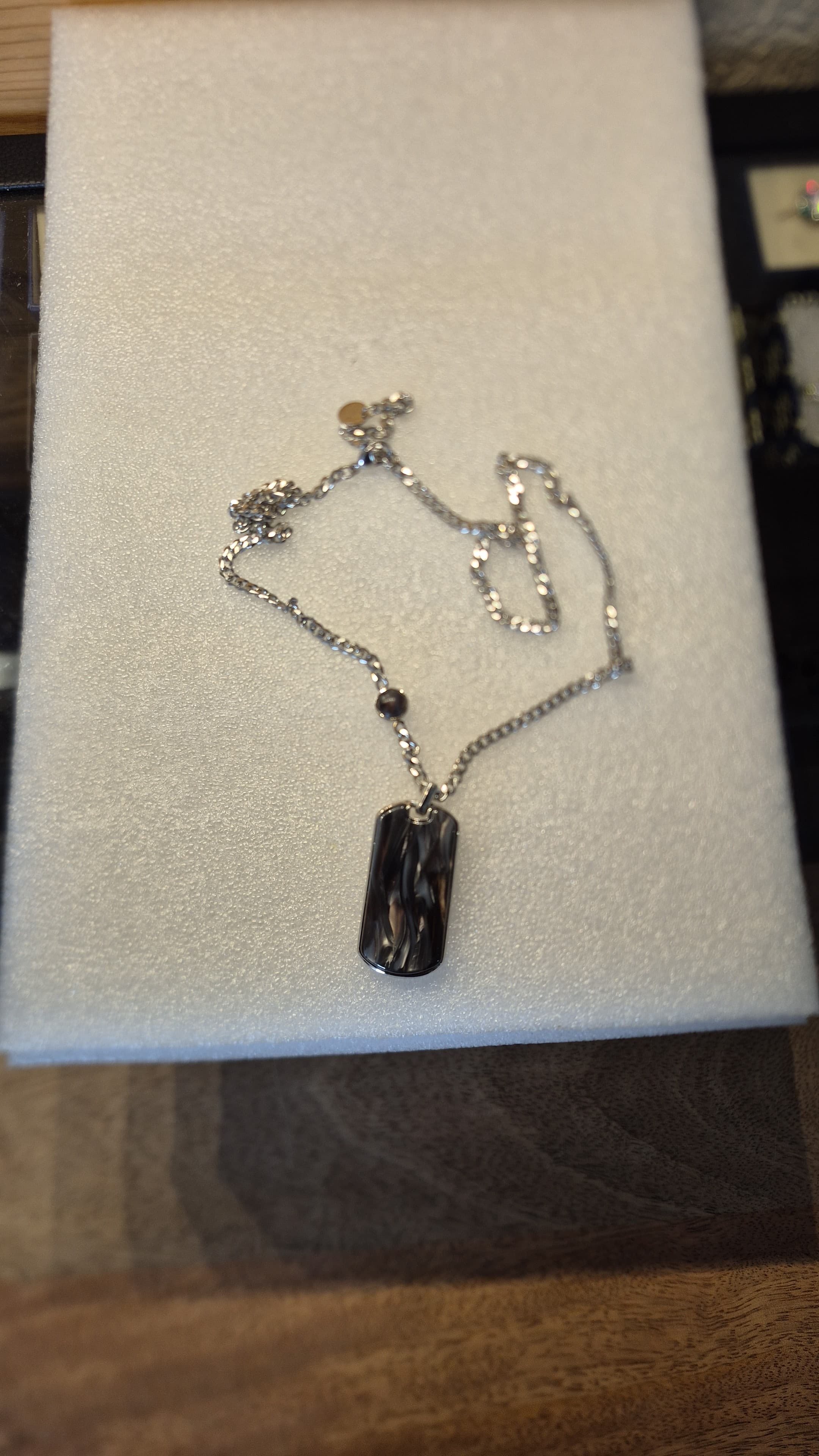 ER010-N: Marbleized stone Dog Tag - 21-23.5" stainless steel chain $46. LL