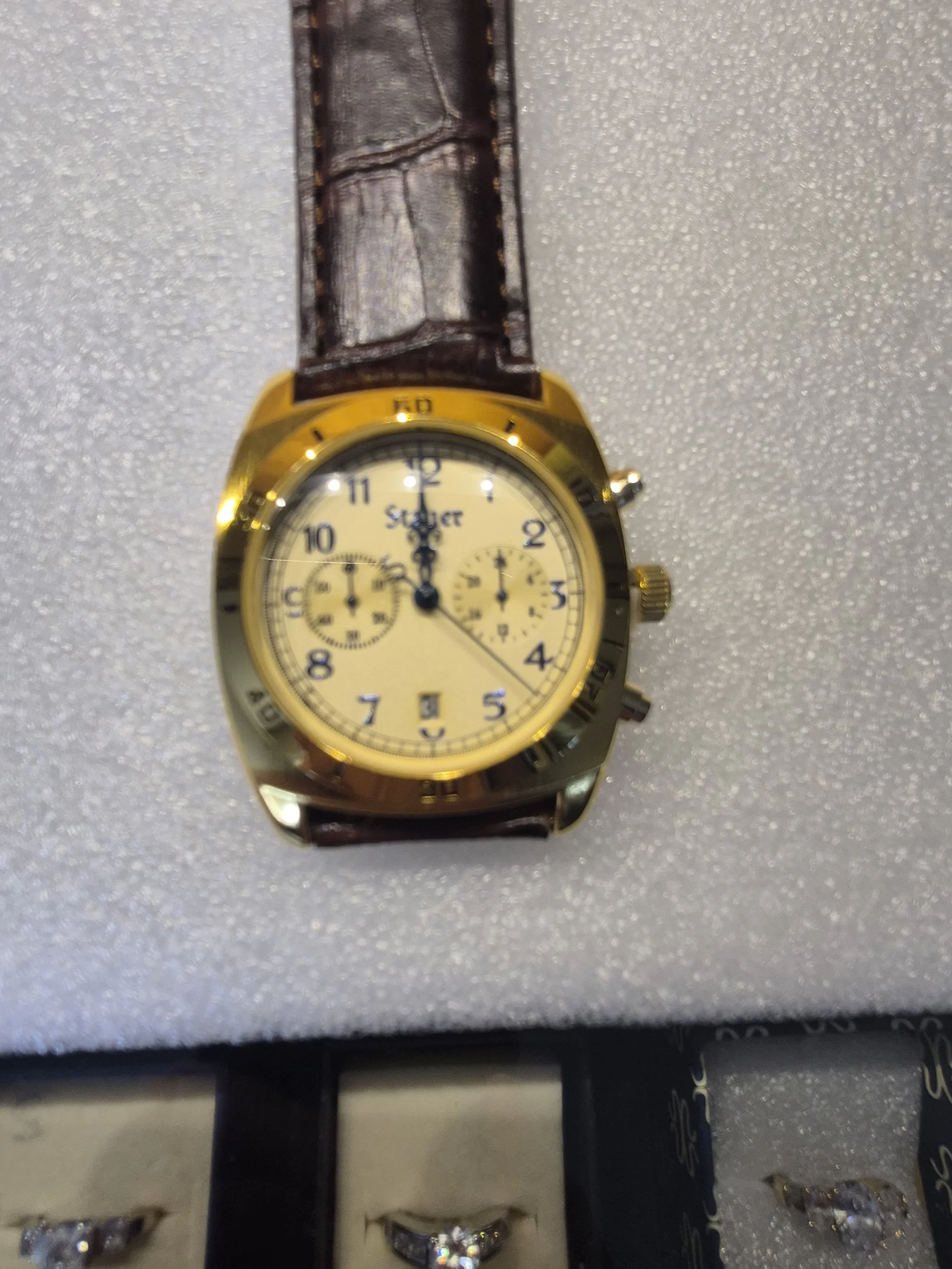 ER-005-W: Precision move, date window, 24 hr sub-dial,chronograph second sub-dial, leather band $ 99. LL