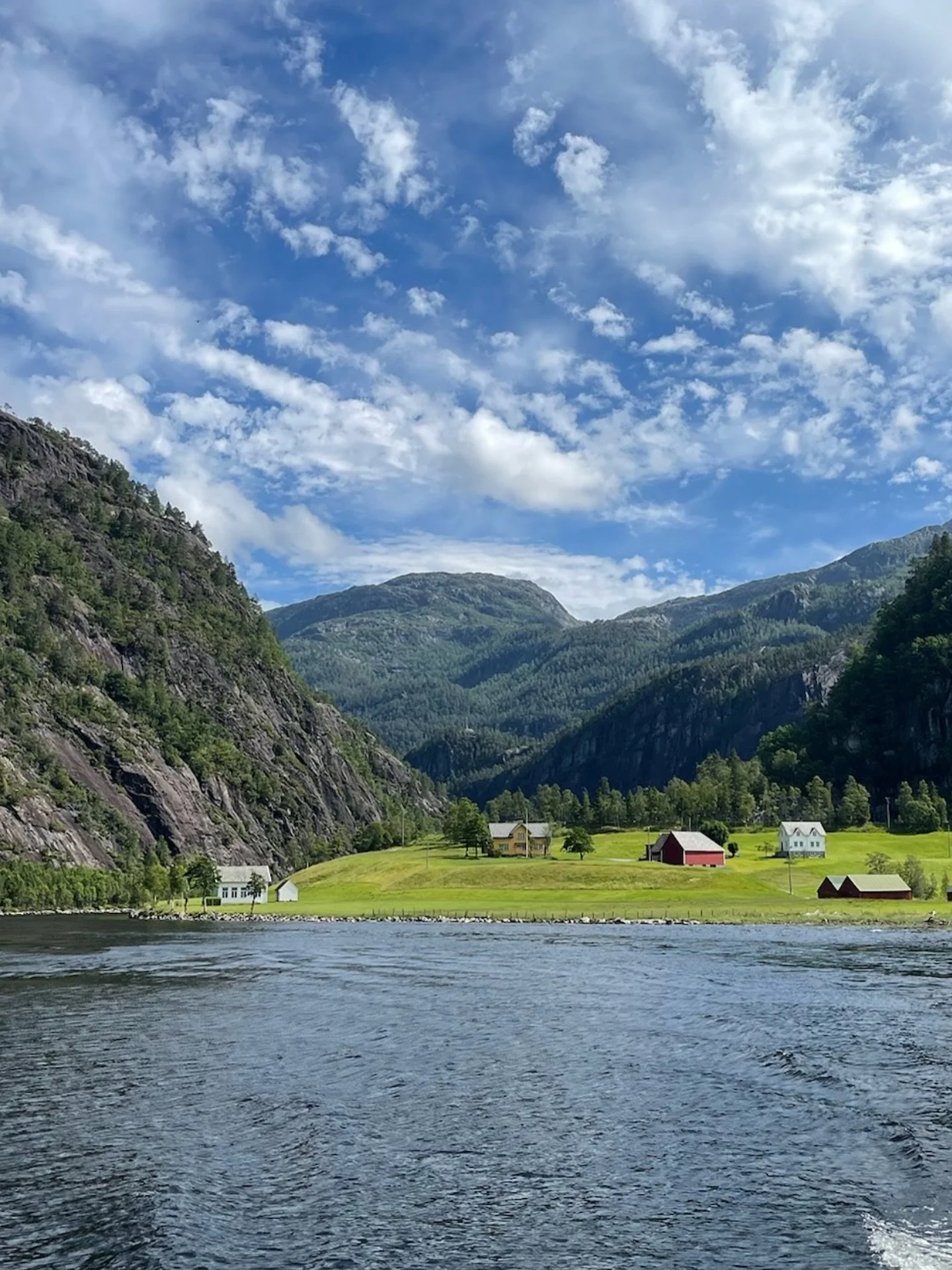 These little villages deep in the fjords of Norway are so charming. #travelnorway🇳🇴 #thehappeninghome